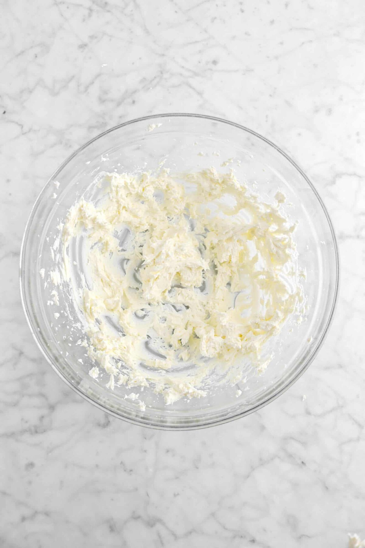 whipped cream cheese in glass bowl