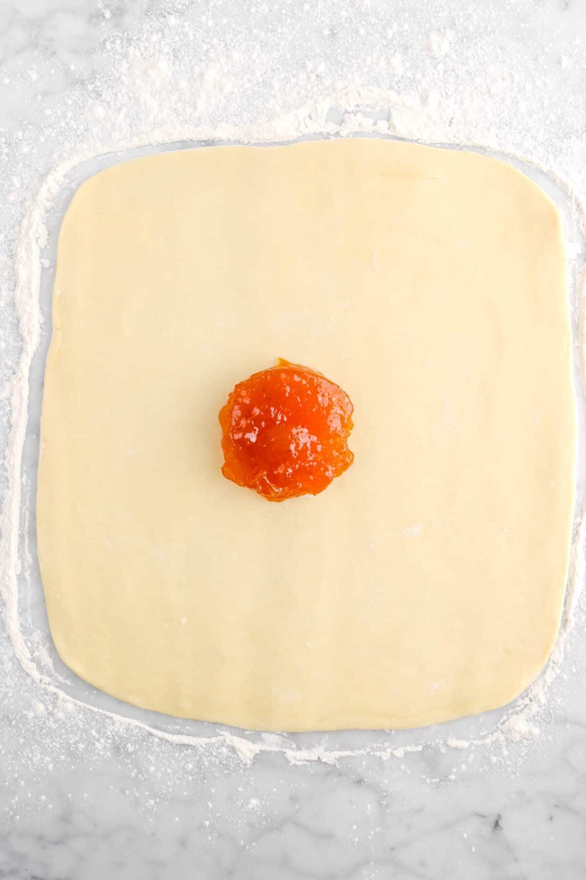 apricot jam added on top of dough