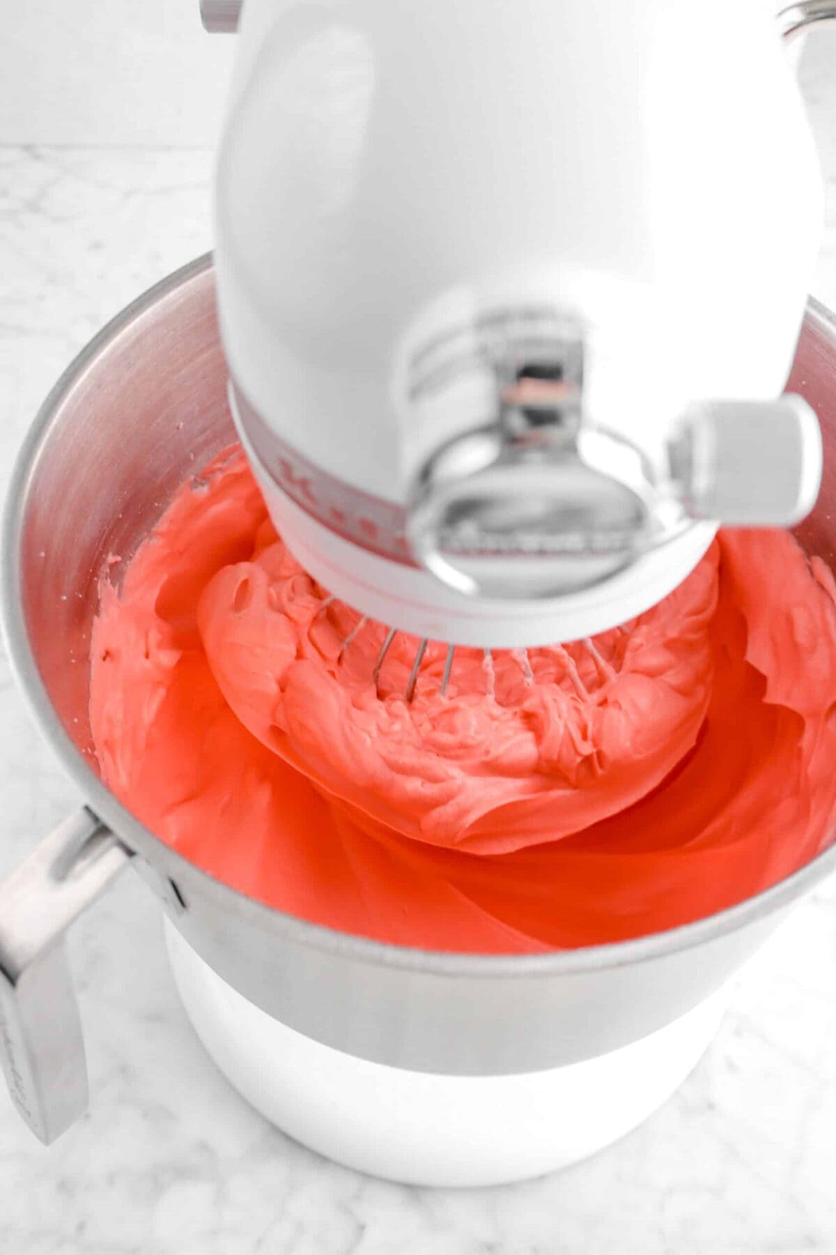 red meringue in mixer