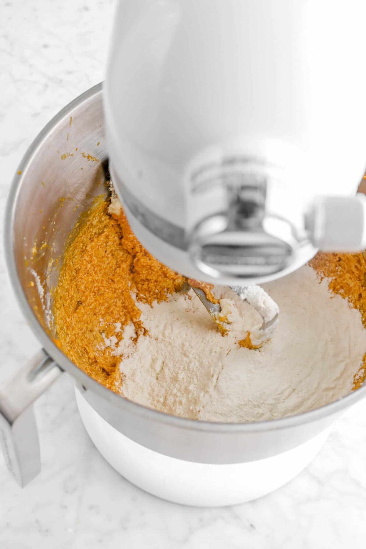 dry ingredients added to pumpkin and butter mixture