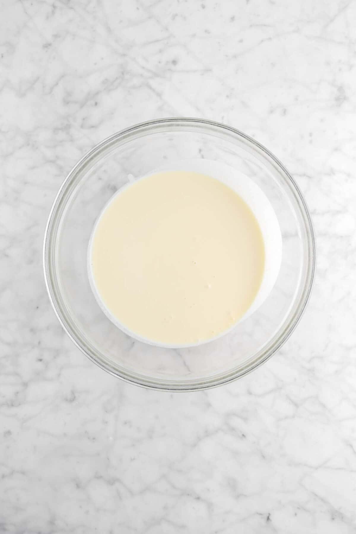 chilled white chocolate mixture in large glass bowl