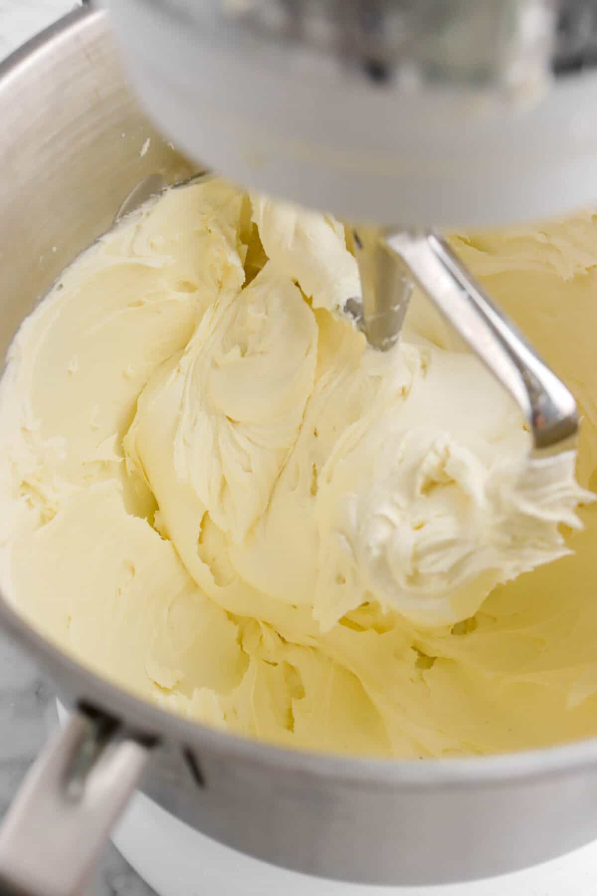 white chocolate frosting in mixer