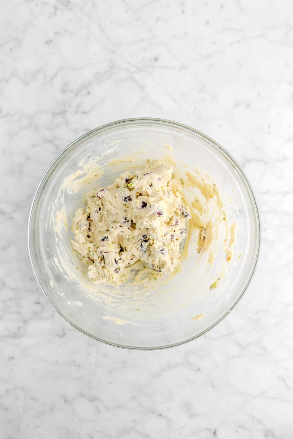 cranberry pistachio cookie dough in glass bowl