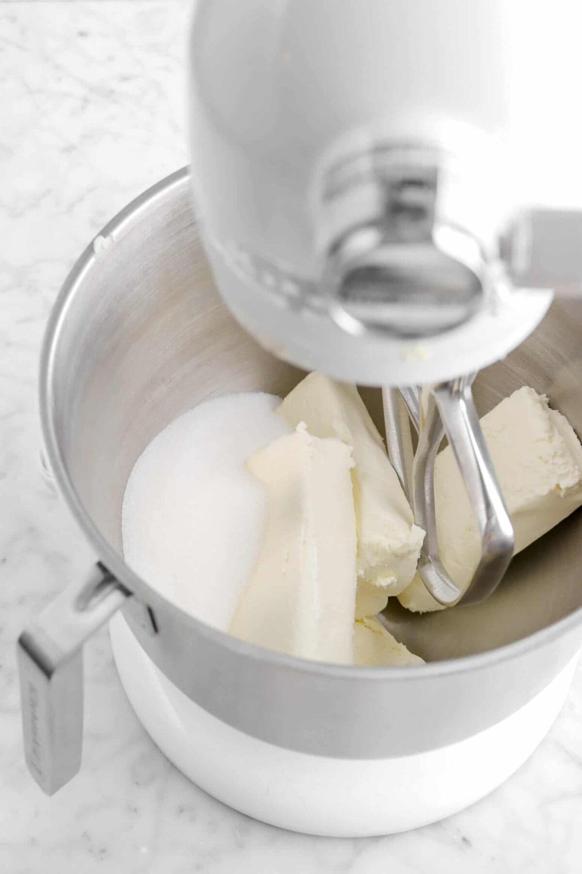 cream cheese and sugar in mixer