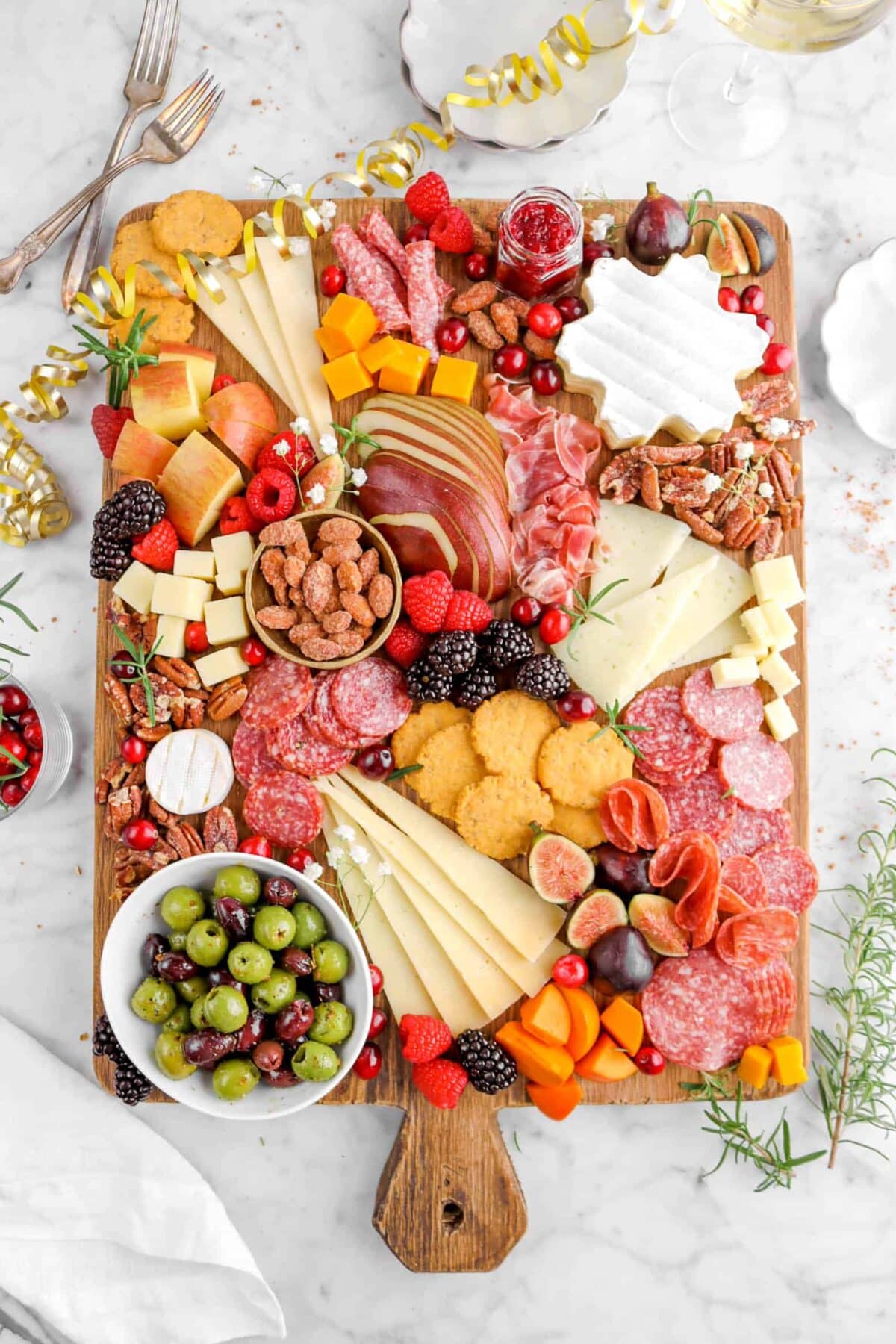 overhead of charcuterie board on marble counter