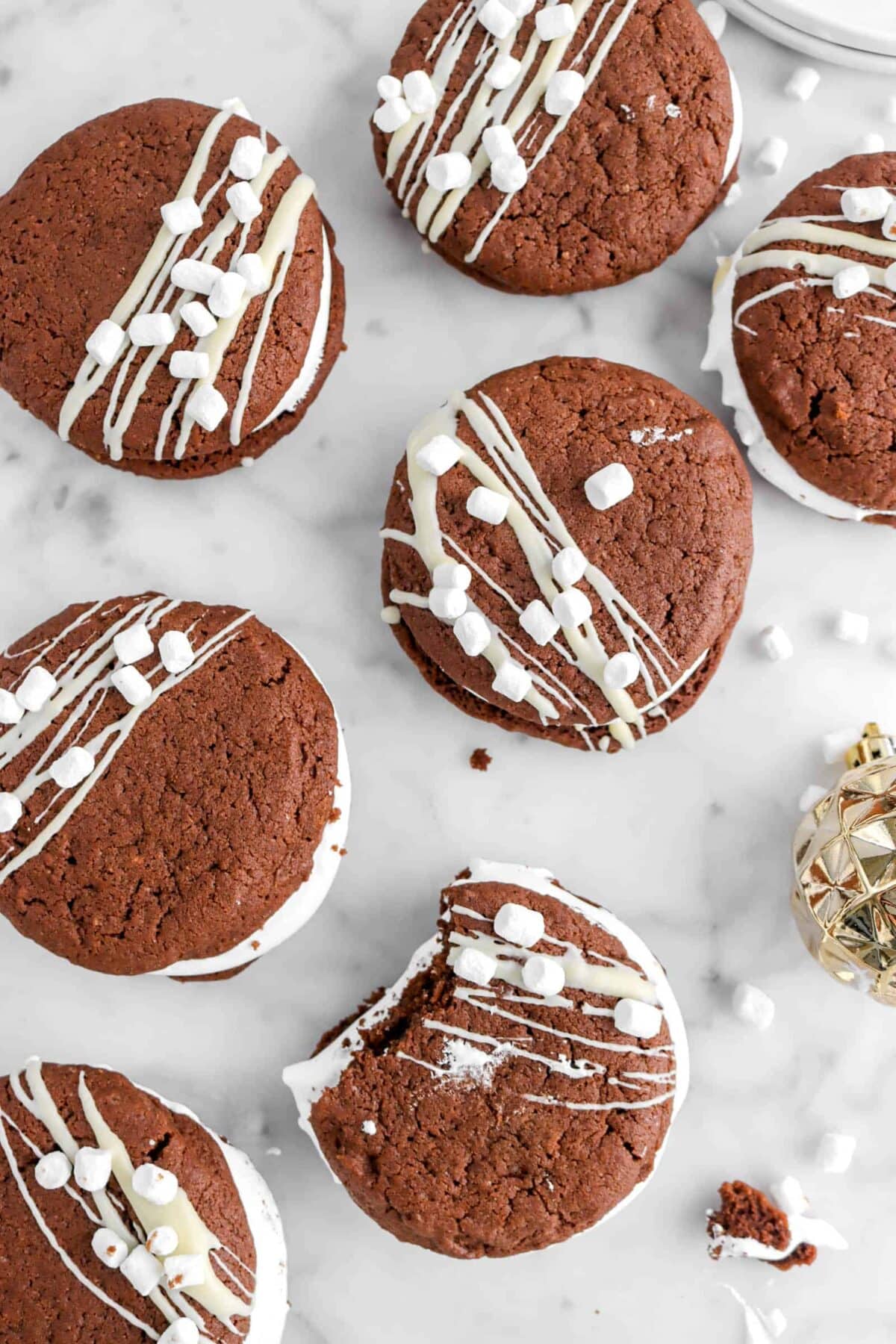 overhead shot of hot cocoa cookies on marble counter