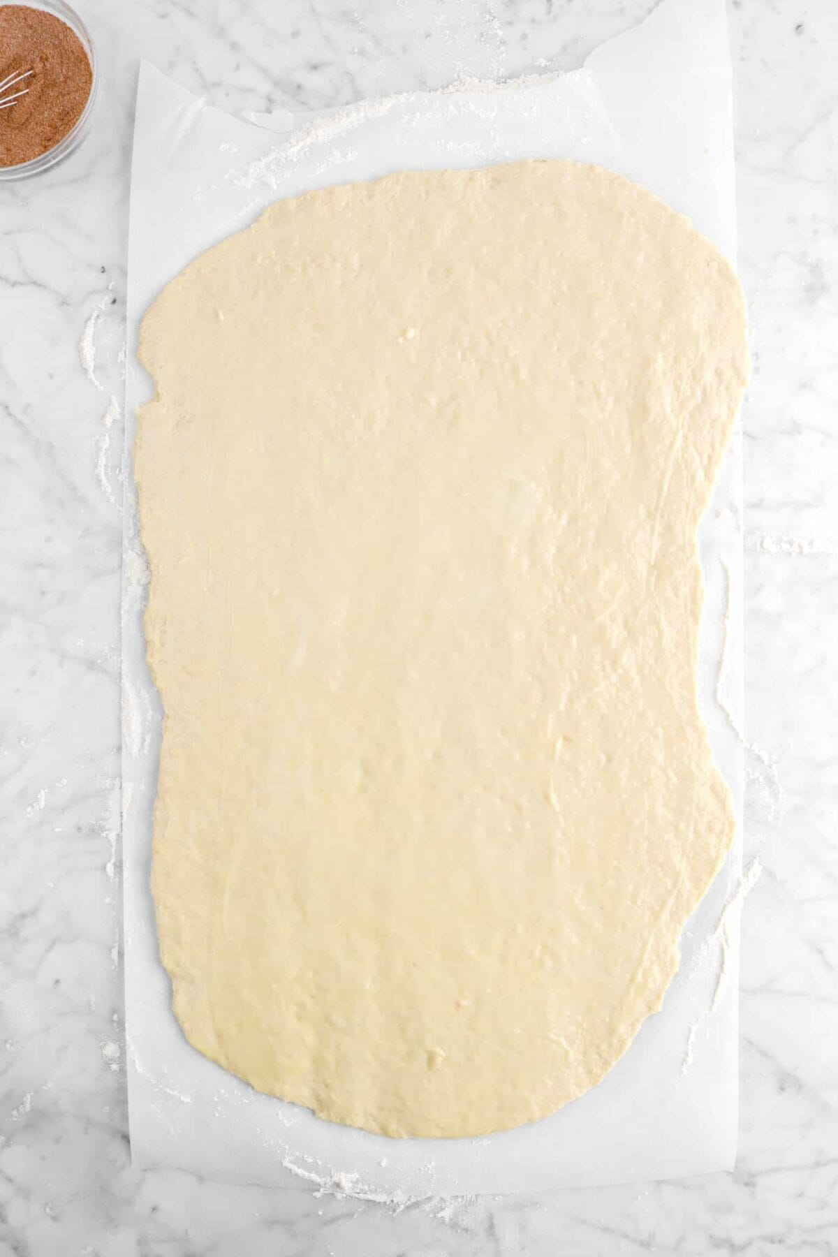 butter spread across dough