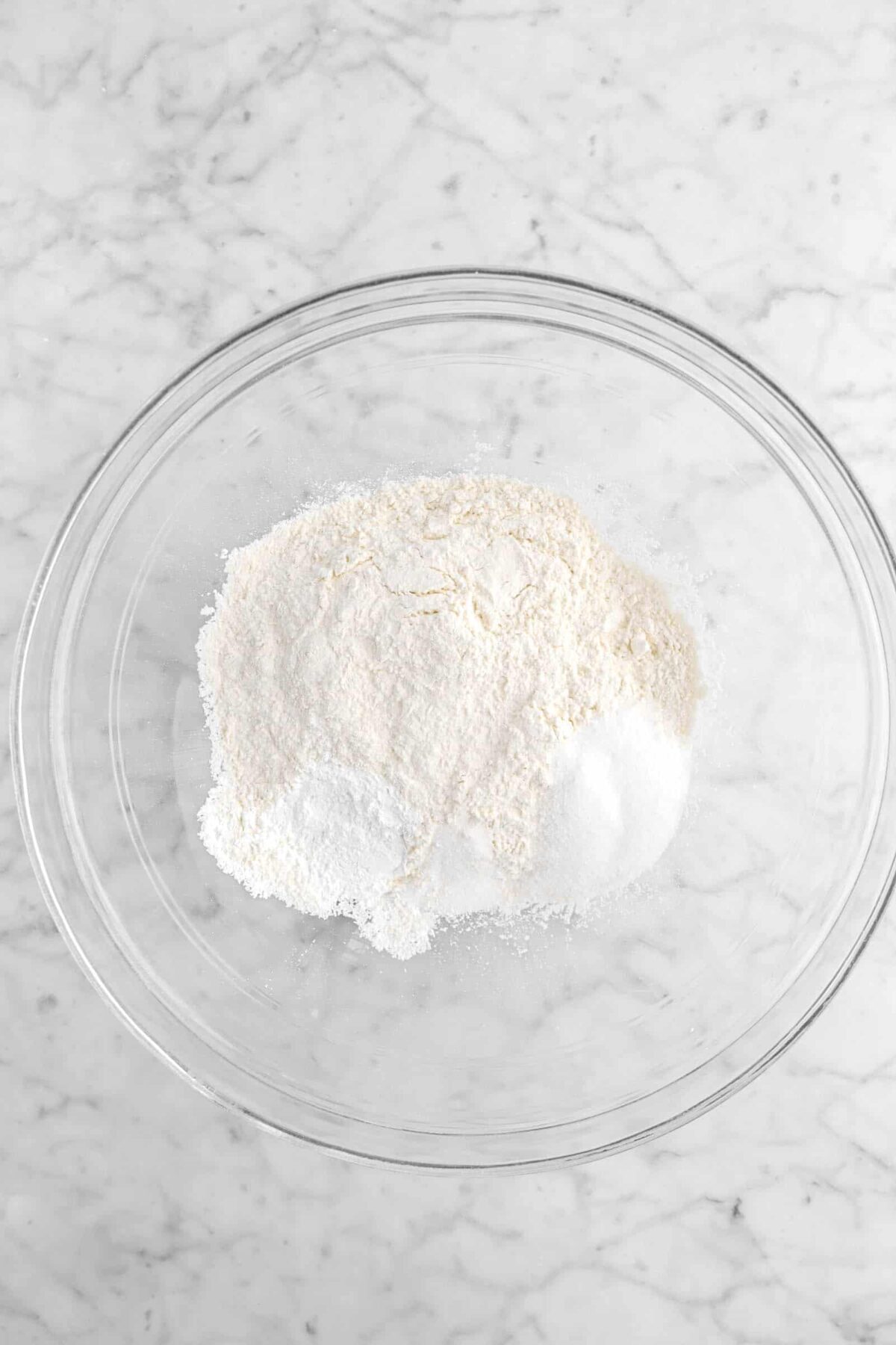 flour, baking powder, salt, and sugar in glass bowl