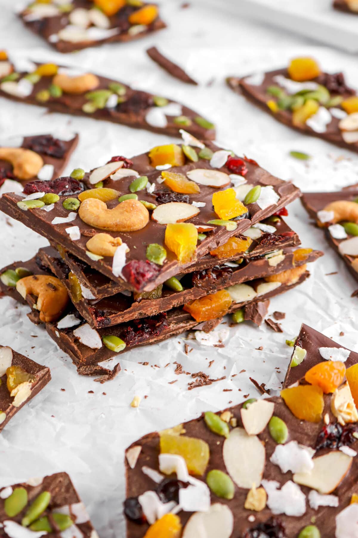 angled close up of four stacked pieces of chocolate bark