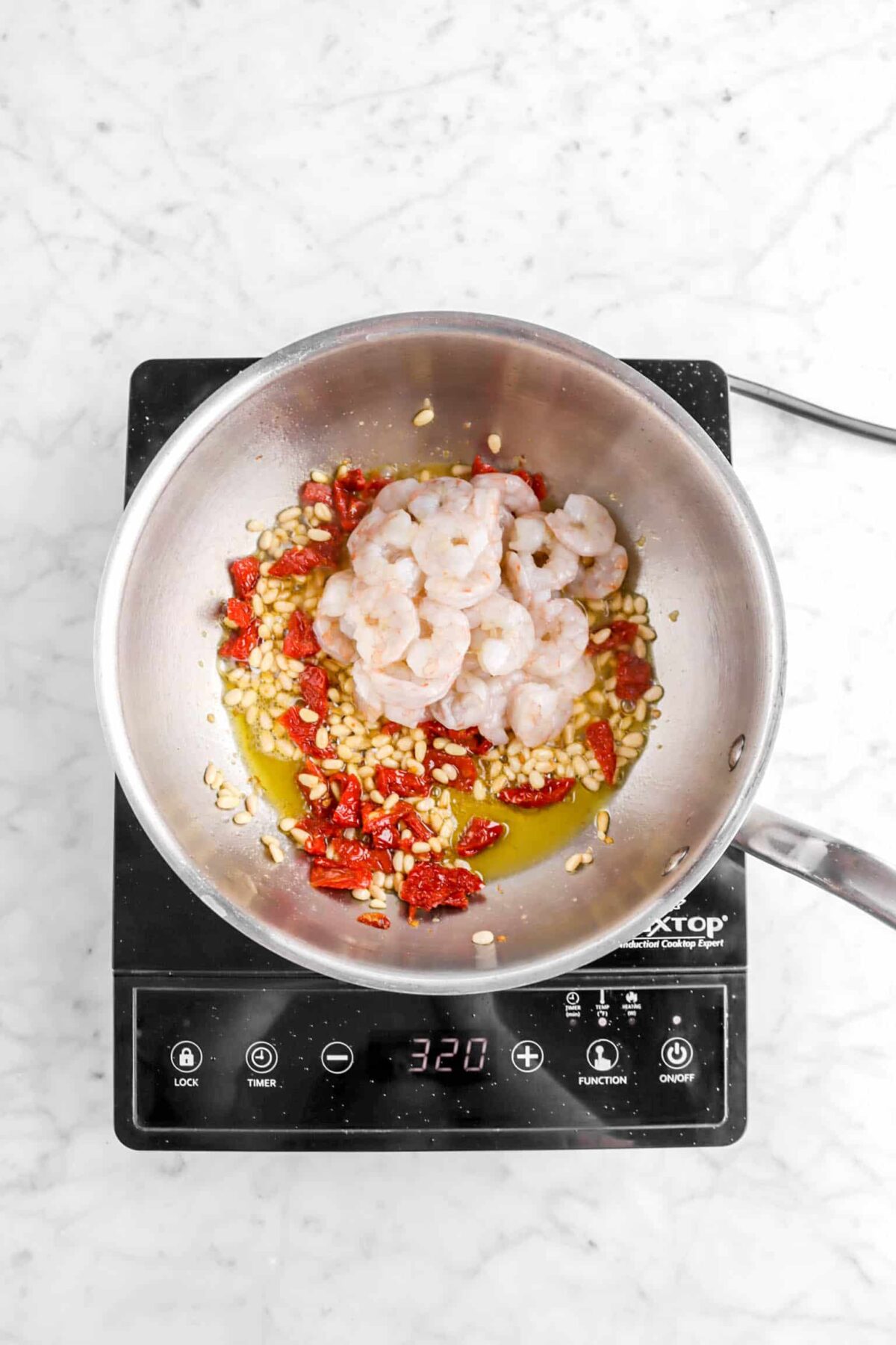 shrimp added to sauté pan
