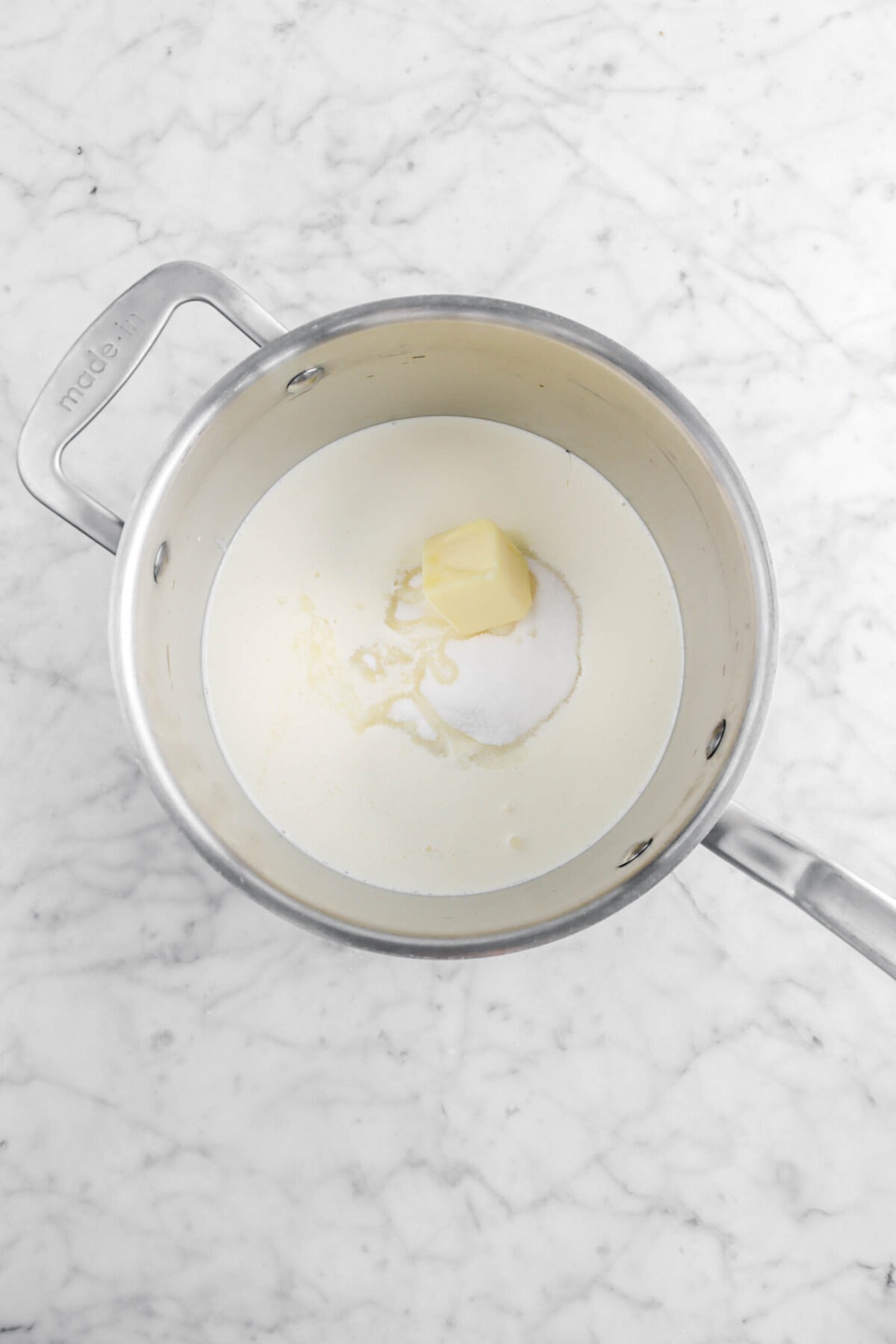 butter, heavy cream, sugar, and corn syrup in medium sized pot