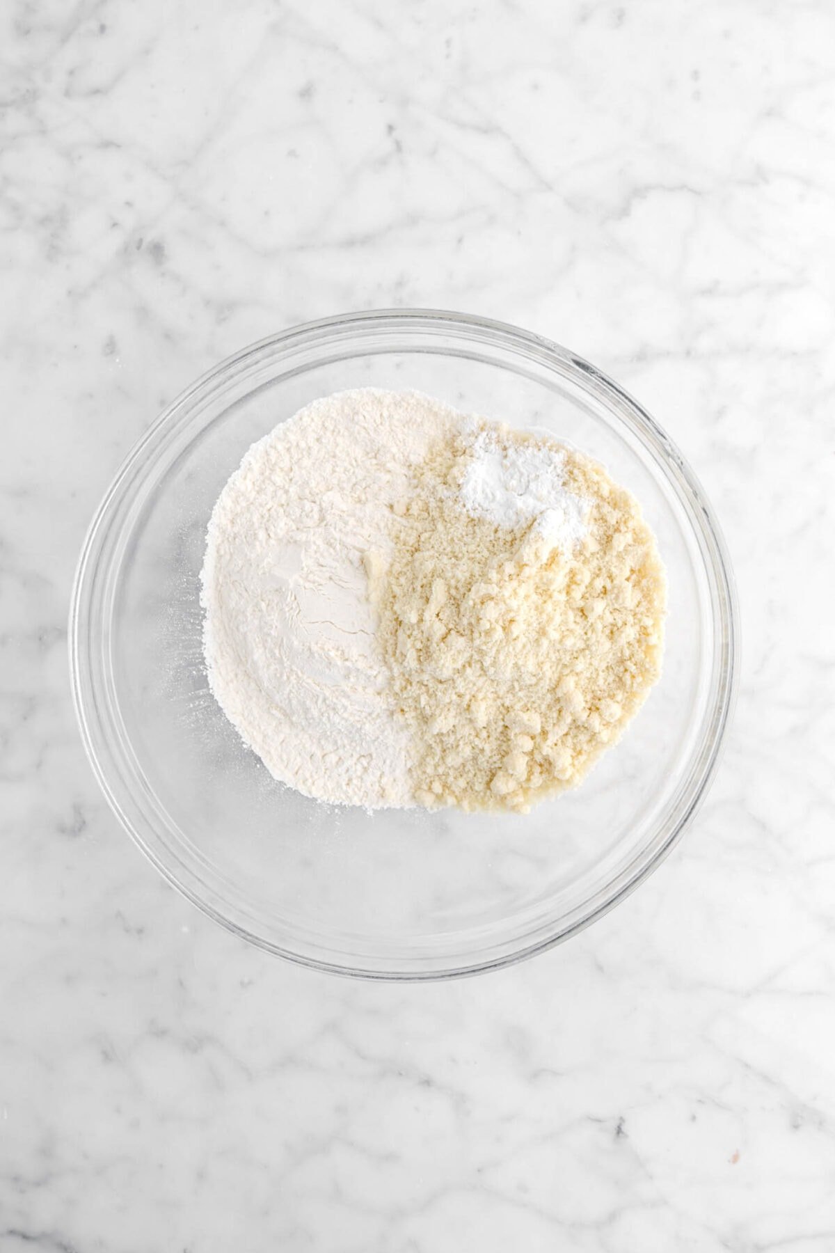 almond flour, baking powder, and flour in glass bowl