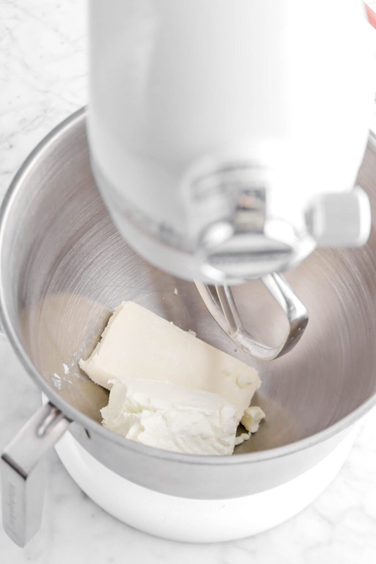 goat cheese and cream cheese in mixer