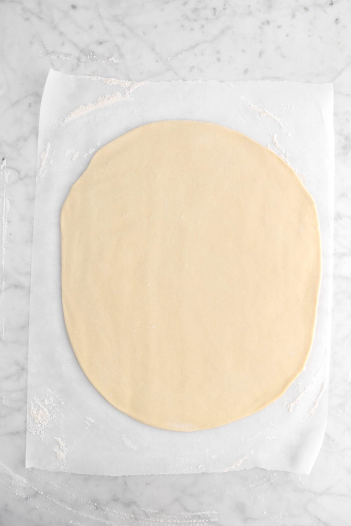 rolled dough on parchment paper