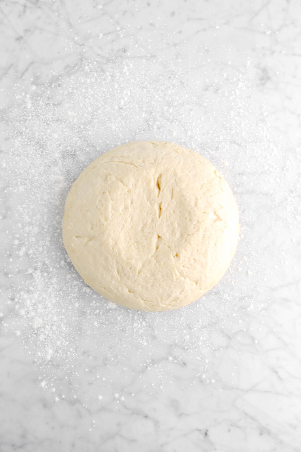 dough on floured marble