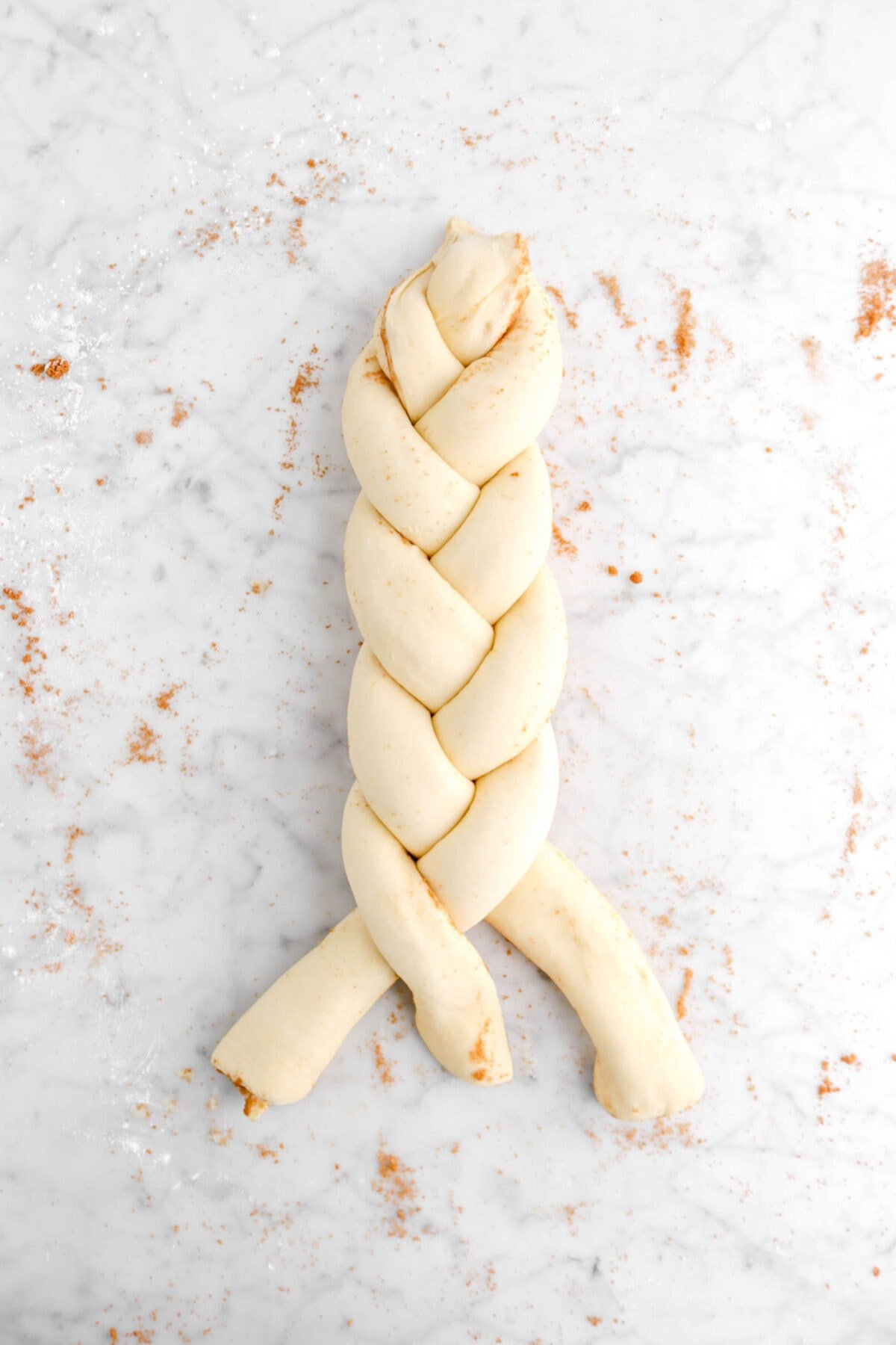three ropes of dough mostly braided
