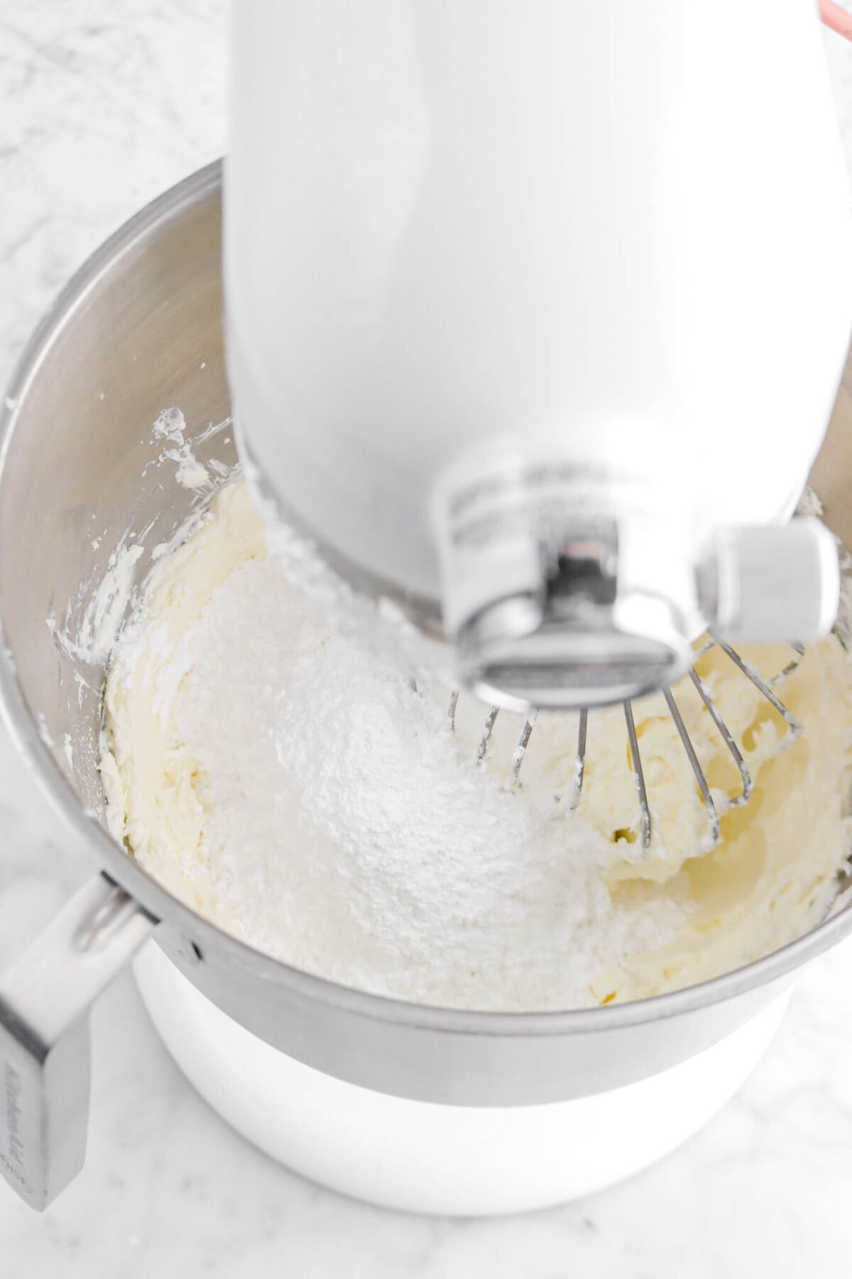 powdered sugar added to cream cheese mixture