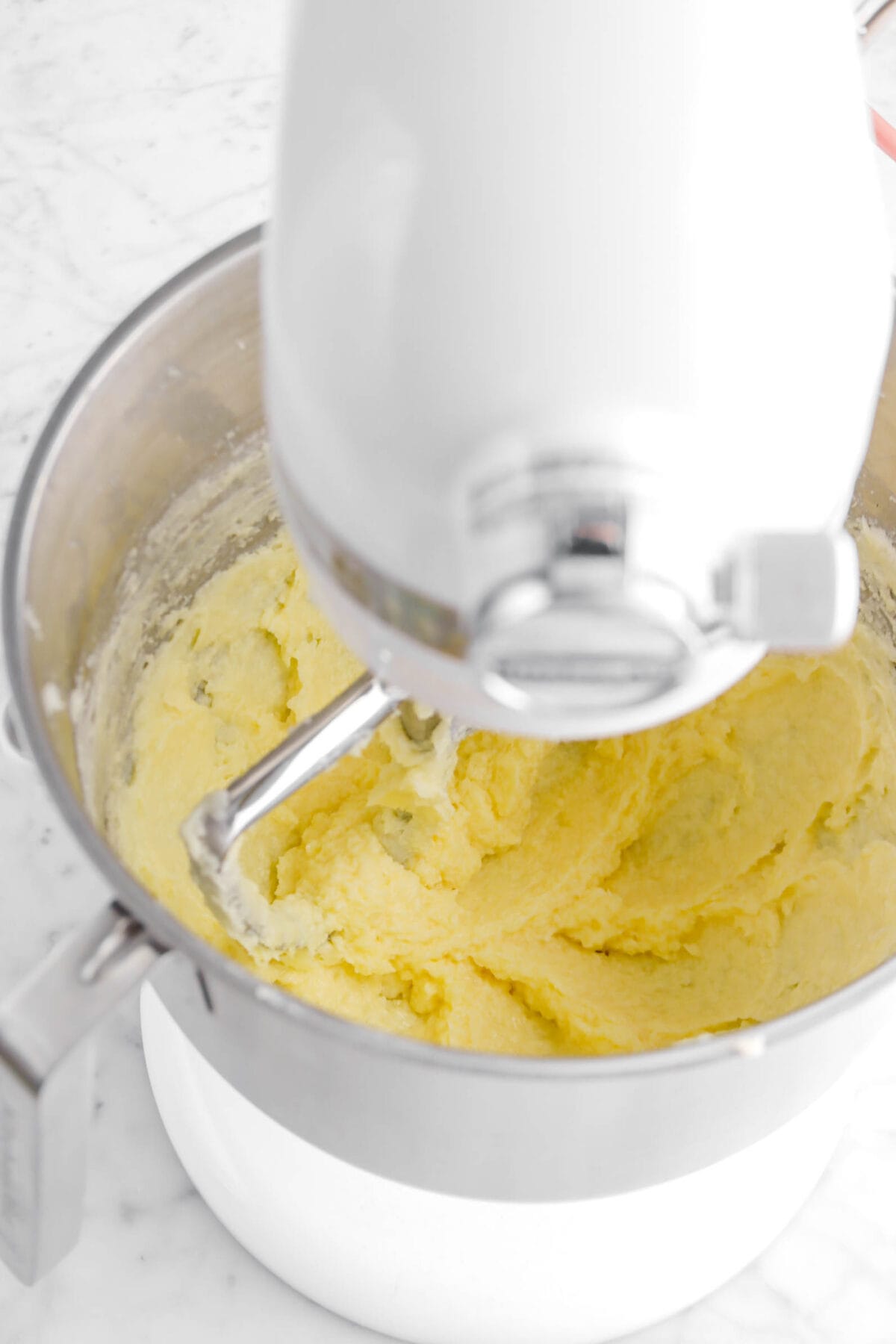 eggs stirred into butter and sugar mixture