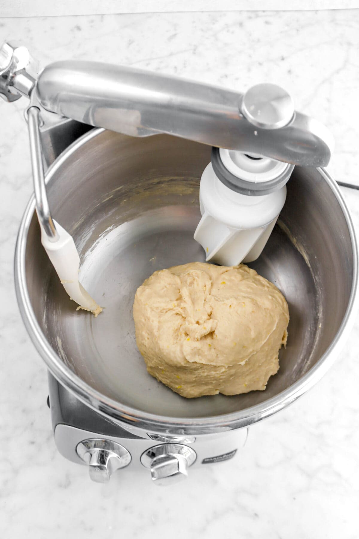 rough dough in bowl of mixer