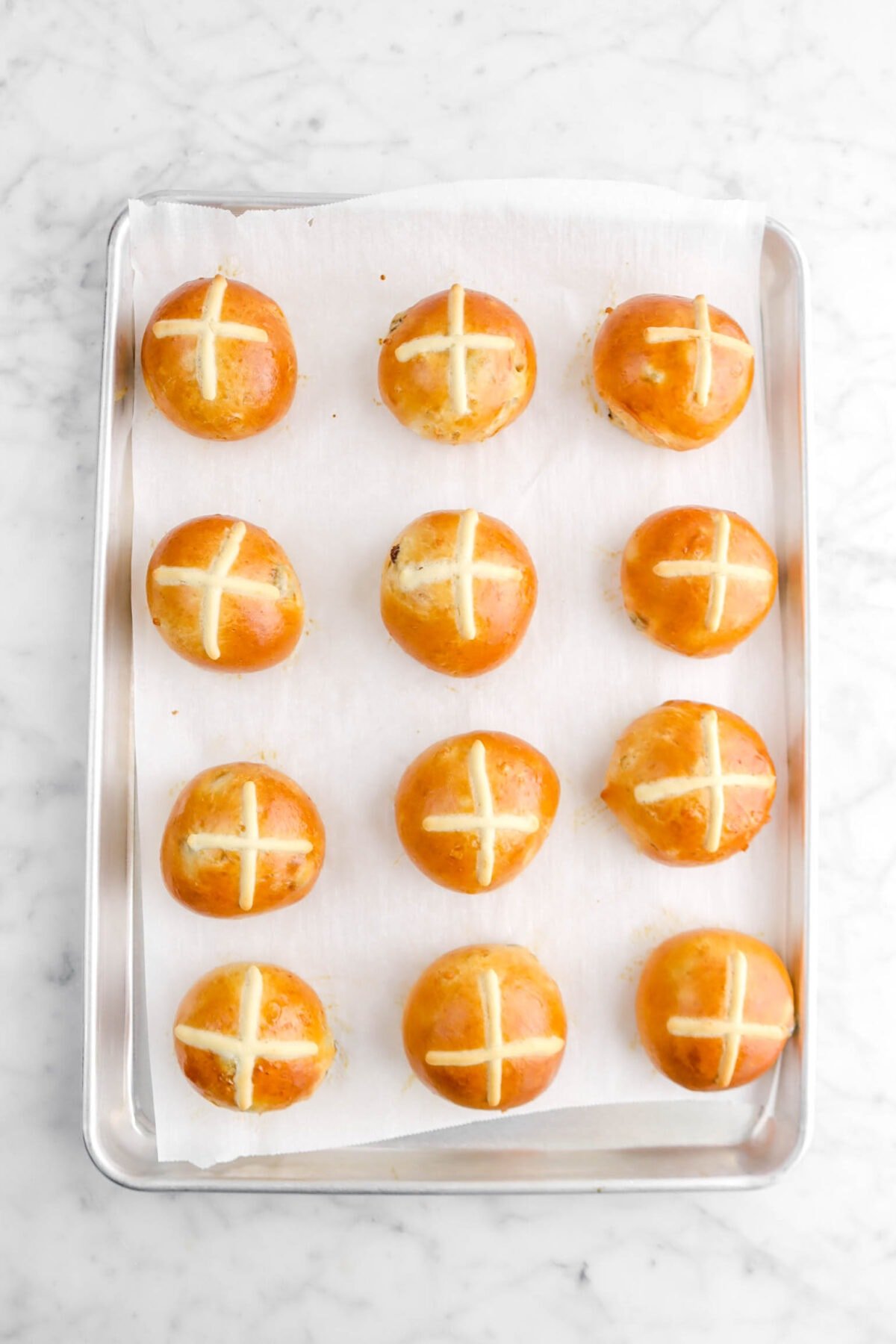 baked hot cross buns on sheet pan