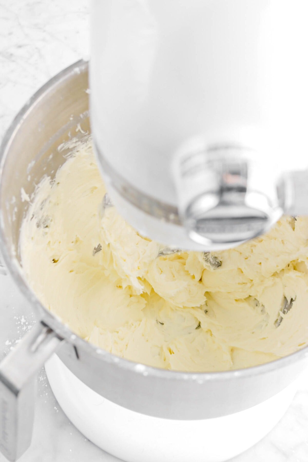 powdered sugar stirred into butter in bowl of stand mixer