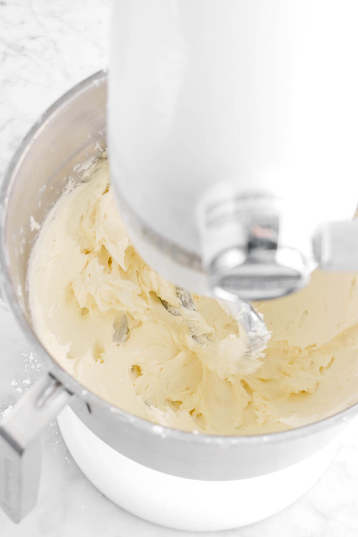 buttercream in bowl of stand mixer