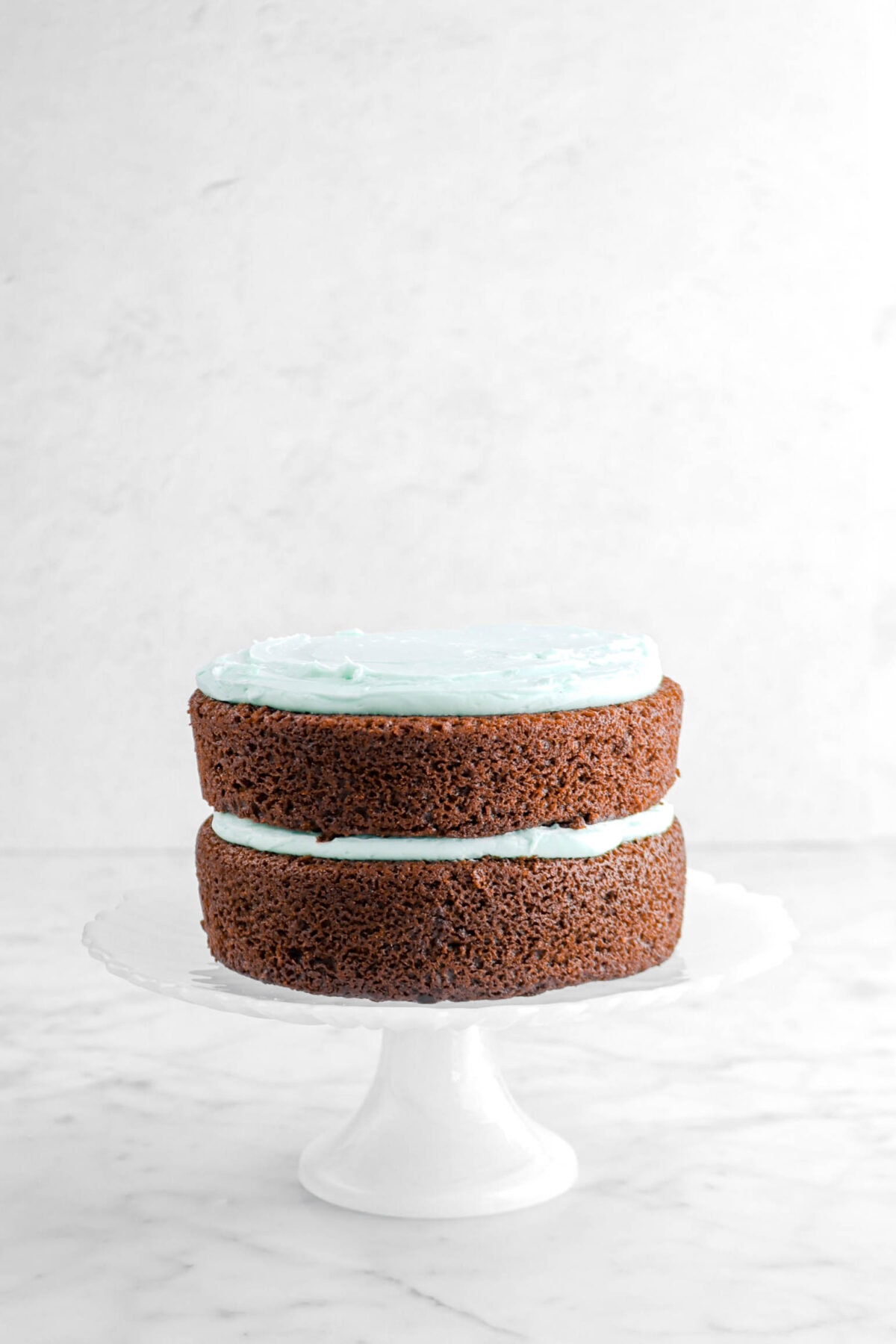 frosting spread onto second cake layer