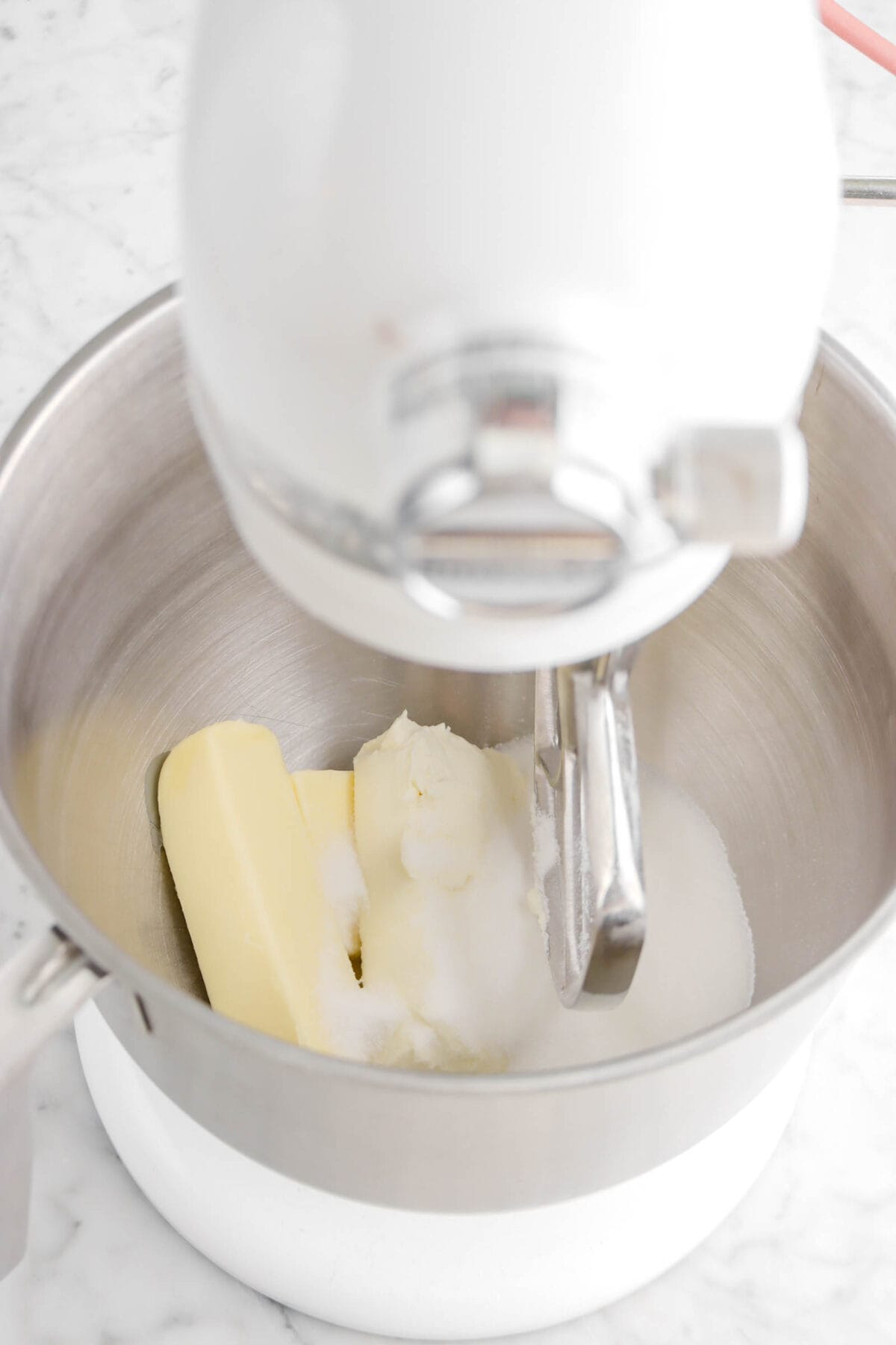 butter, cream cheese, and sugar in mixer