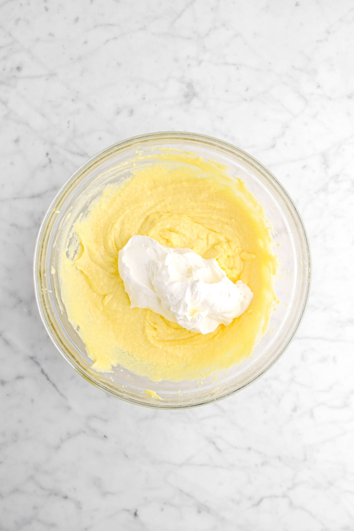 whipped cream added to mascarpone and egg yolk mixture