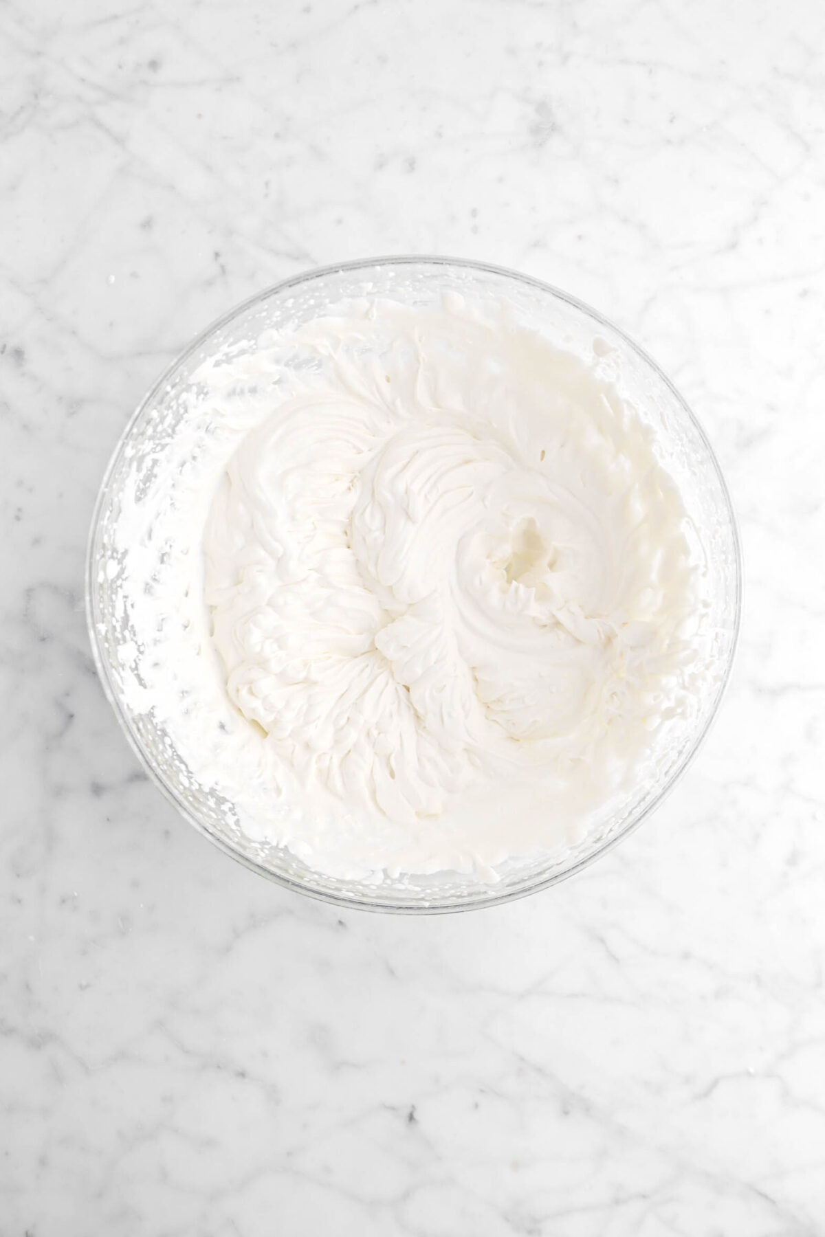 whipped chantilly cream in glass bowl