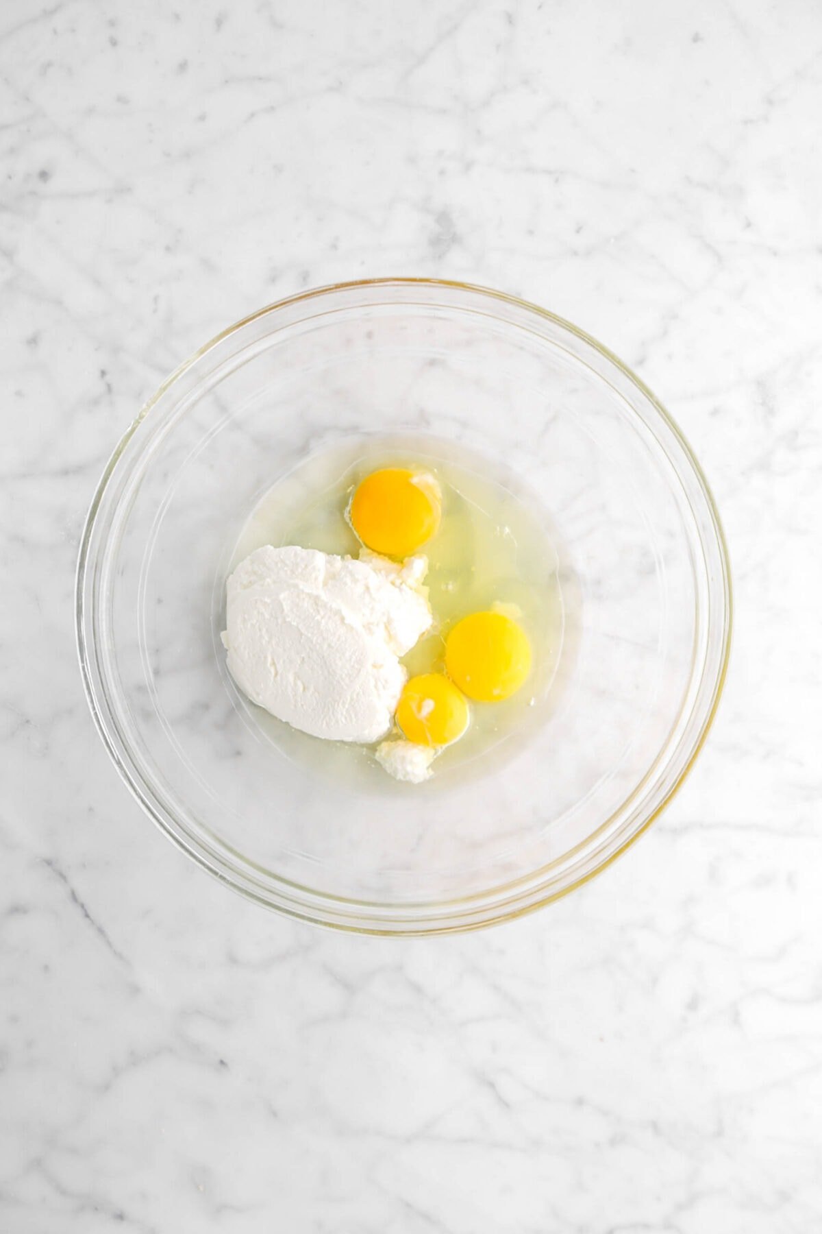 eggs and ricotta in glass bowl