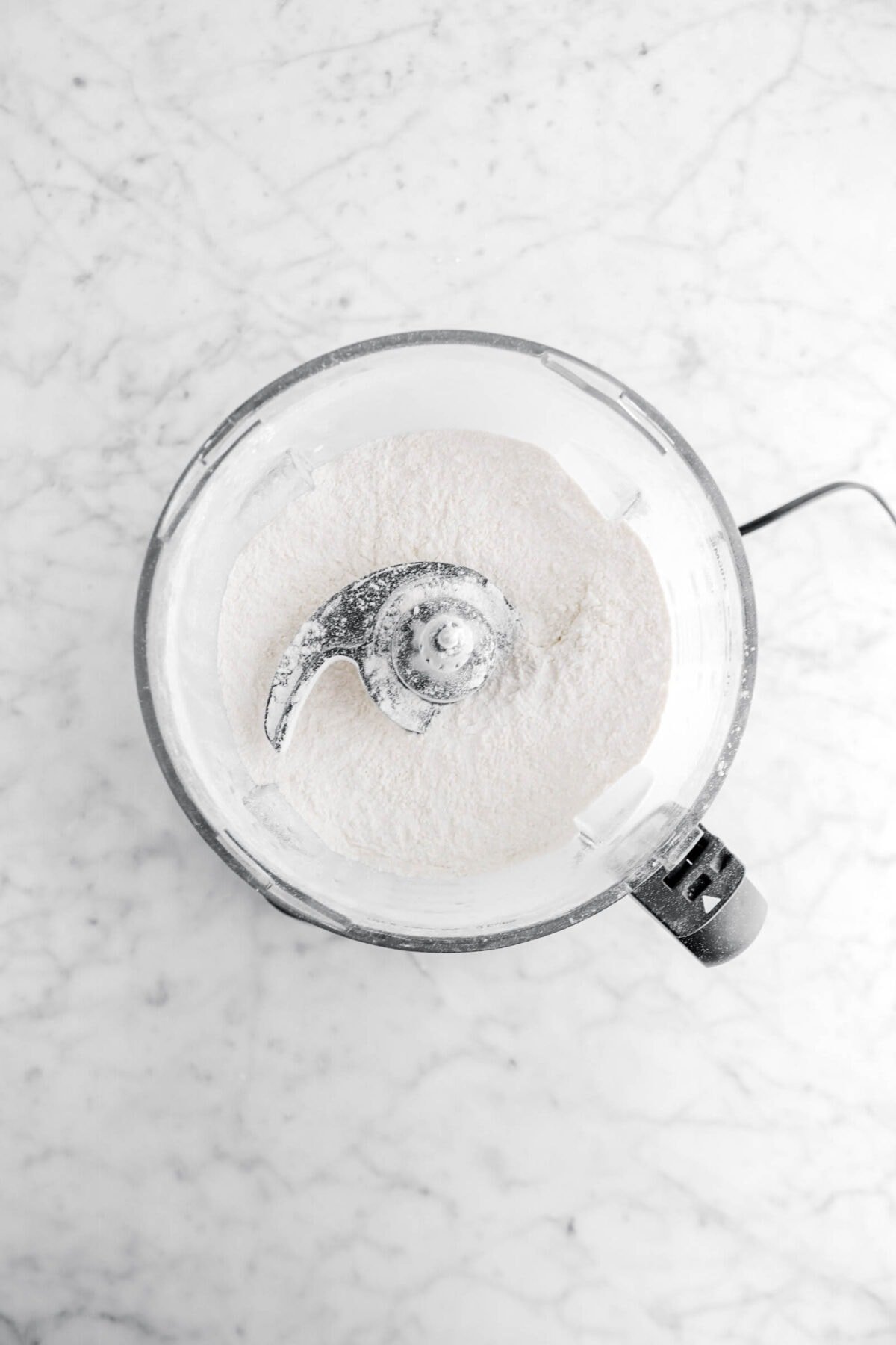 flour and powdered sugar combined in food processor