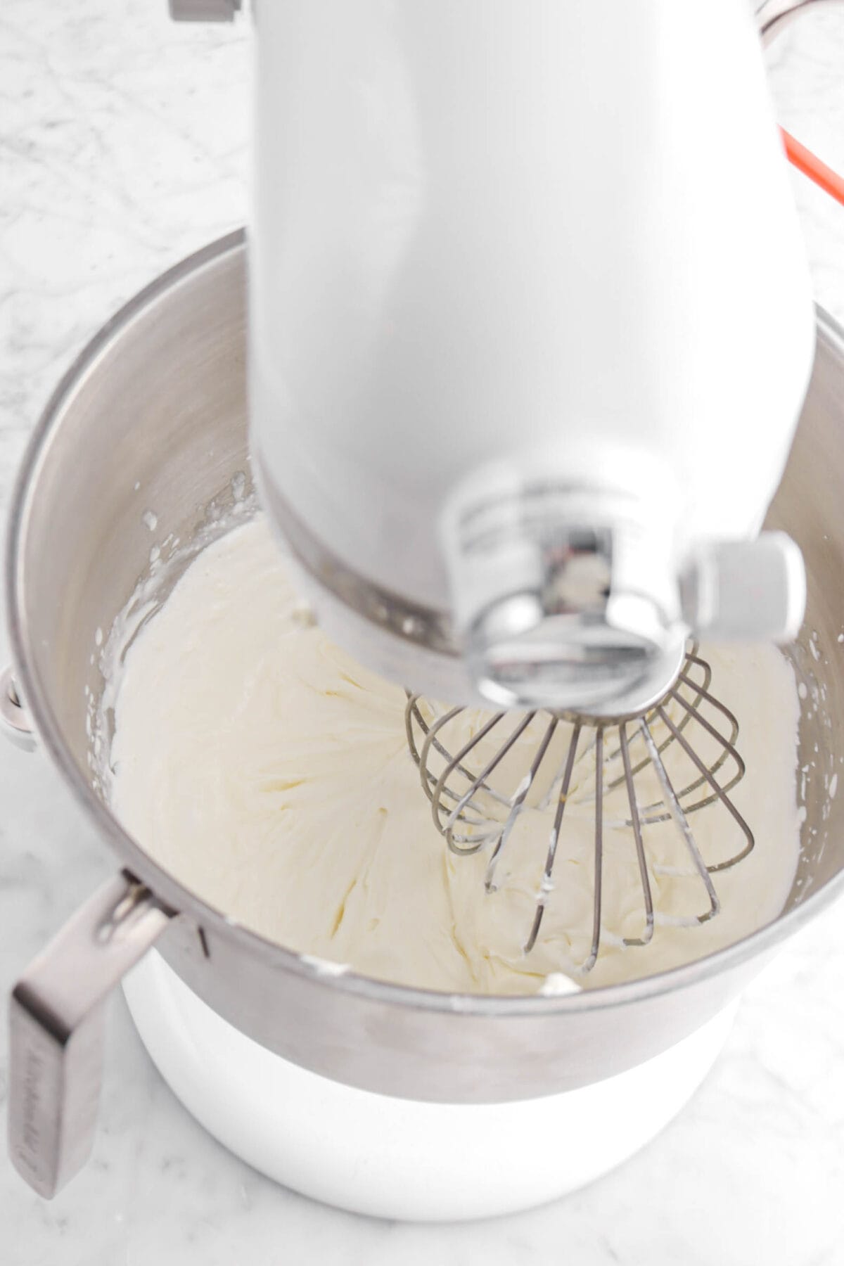 whipped cream and mascarpone in stand mixer