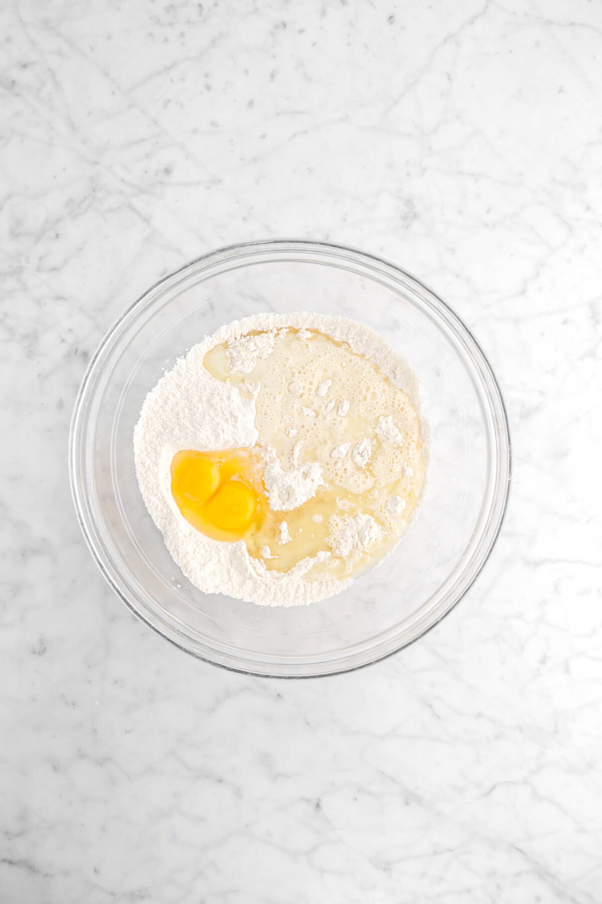 eggs, milk, oil, and vanilla added to dry ingredients
