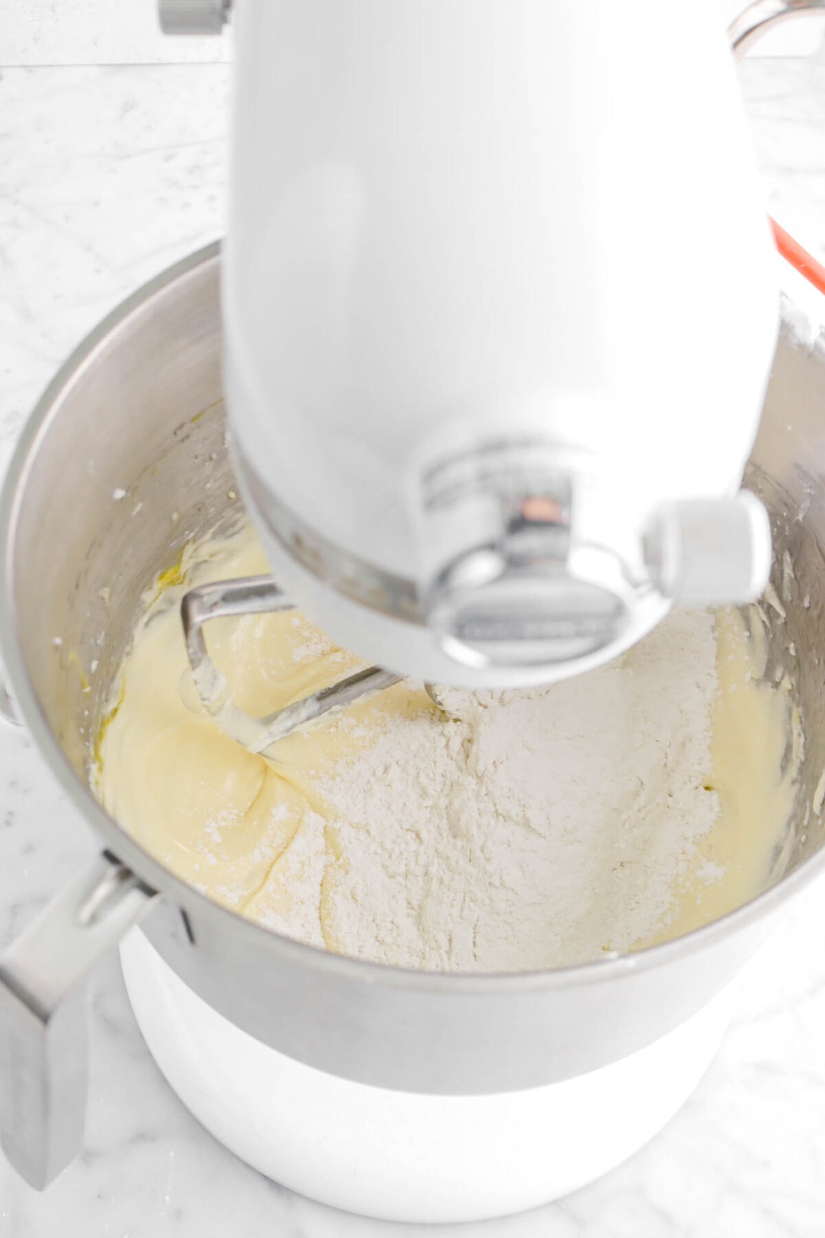 flour added to shortening mixture in stand mixer