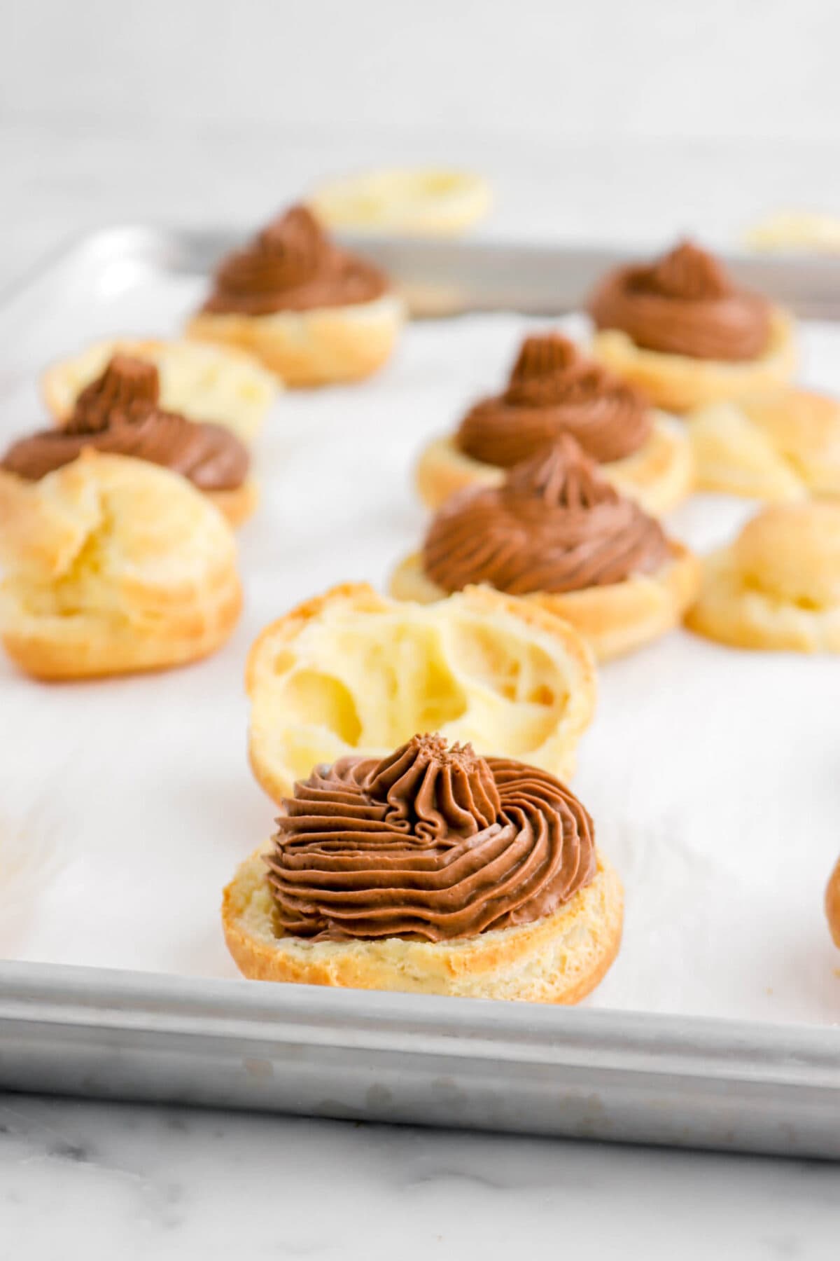 chocolate mousse piped into choux pastry