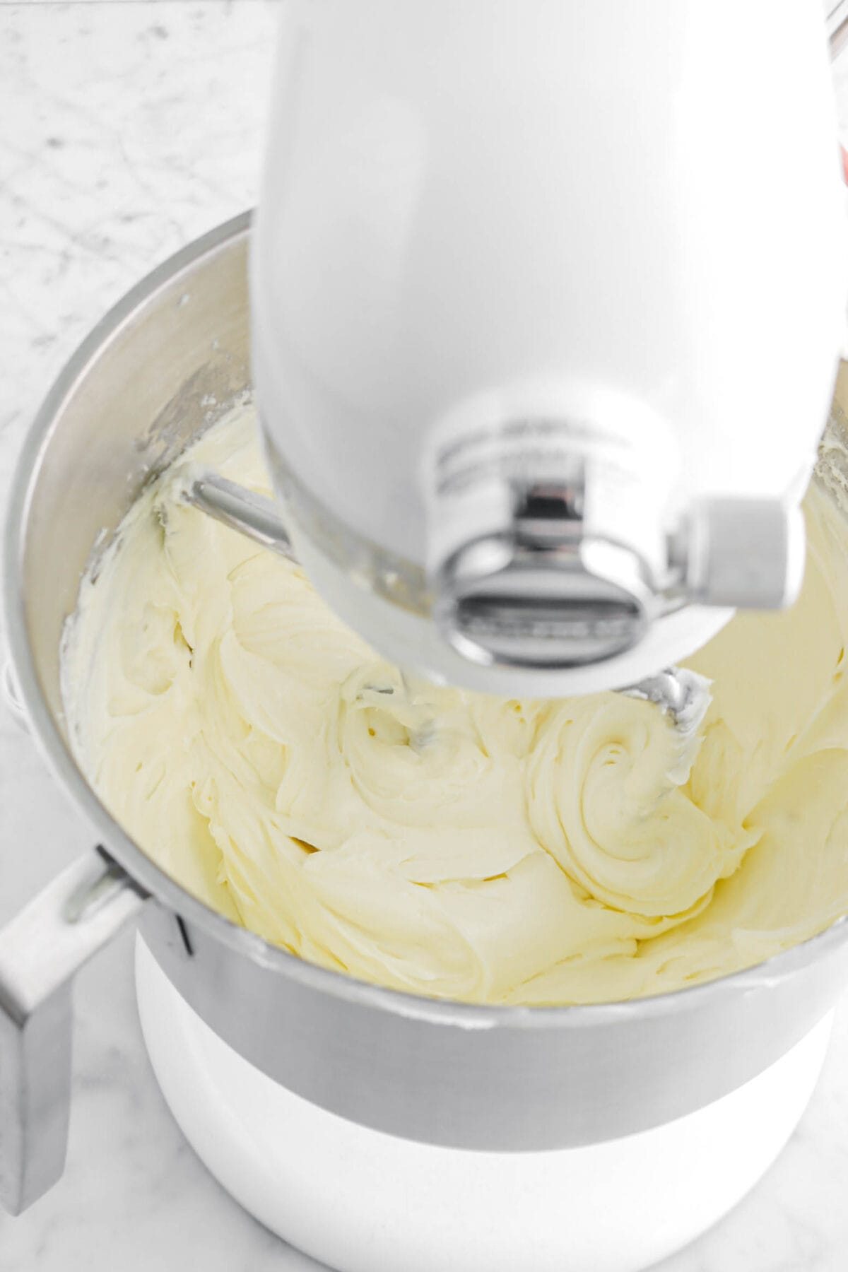 sugar and cream cheese mixture in stand mixer