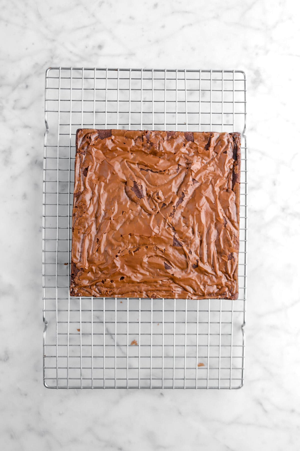 brownie square on cooling rack