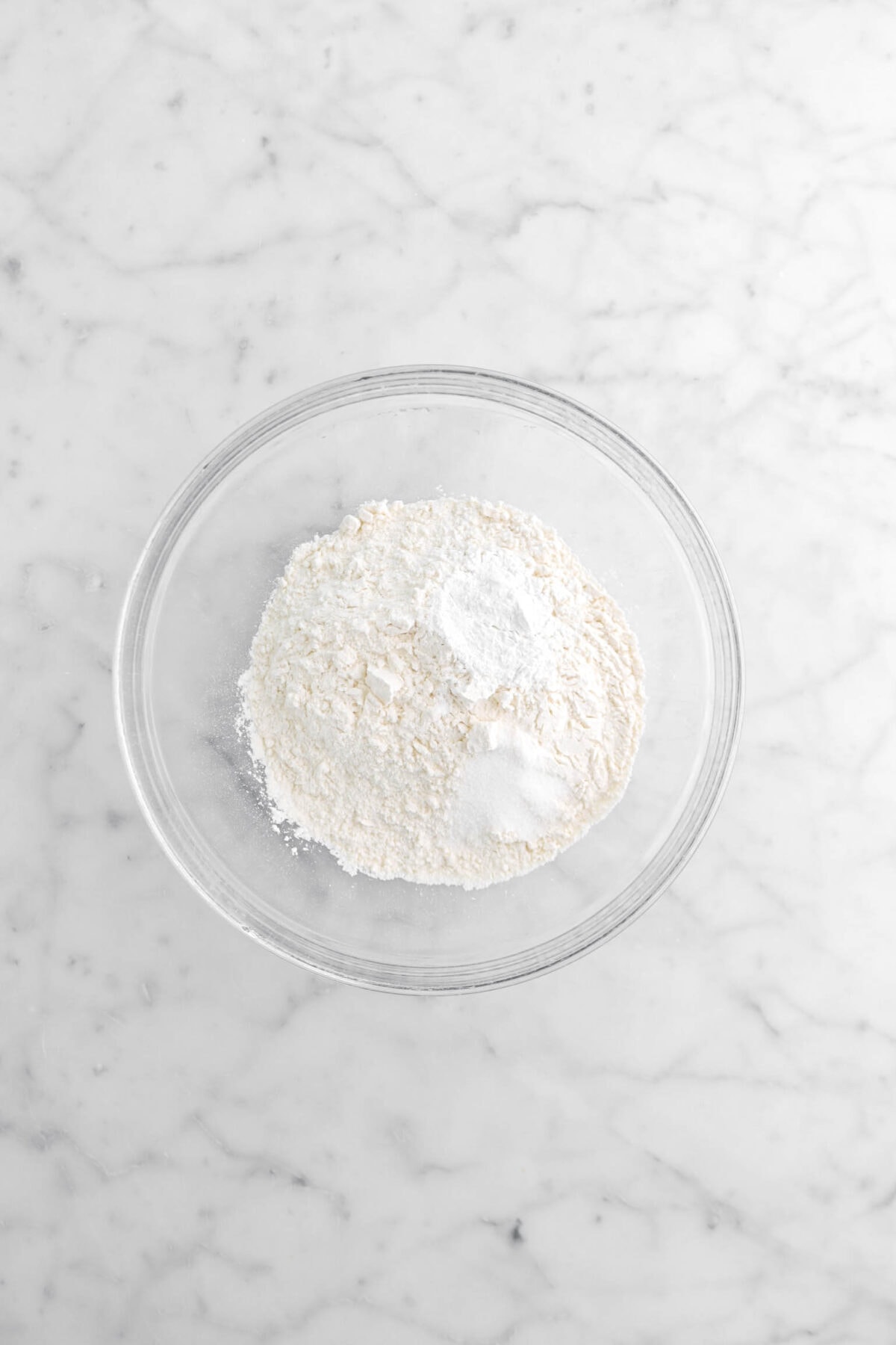 flour, salt, and baking powder in glass bowl
