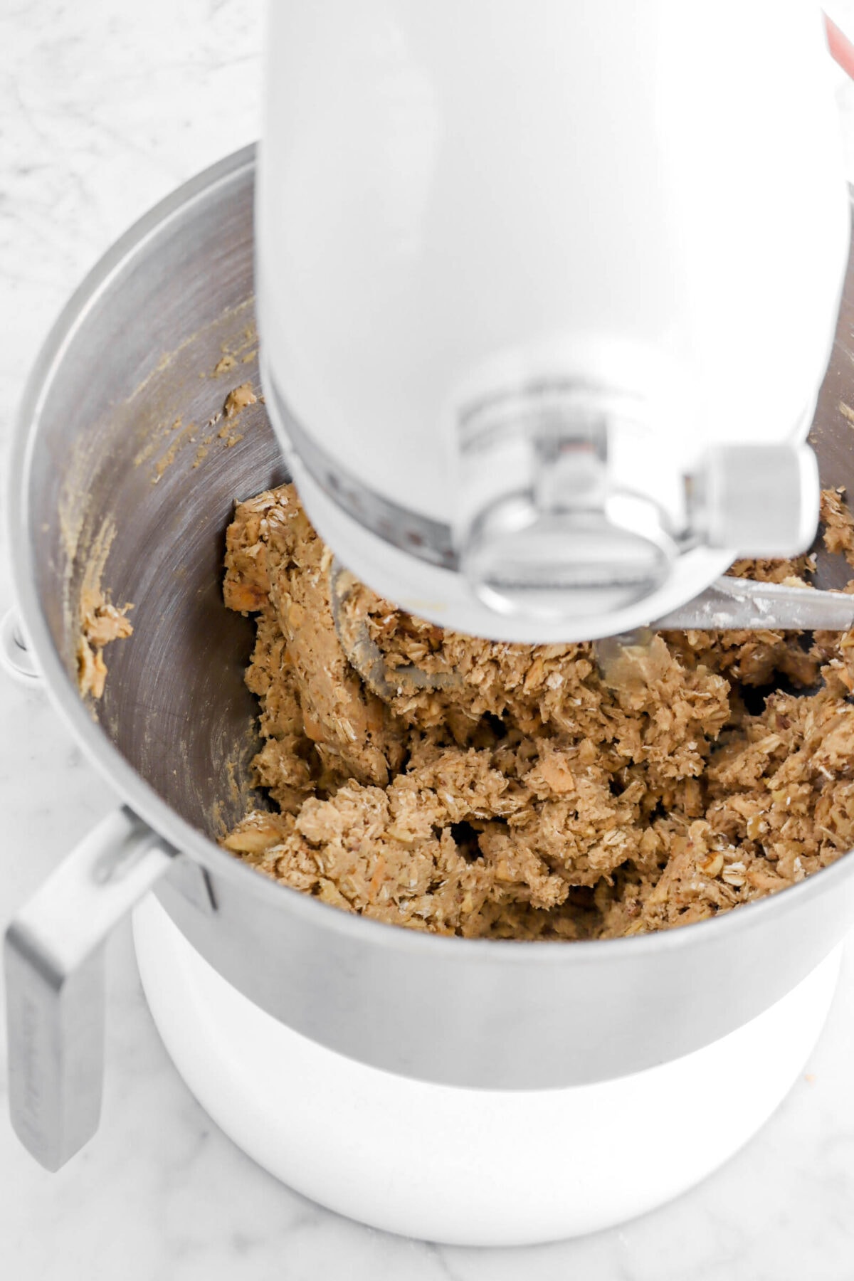oatmeal cookie dough in stand mixer.