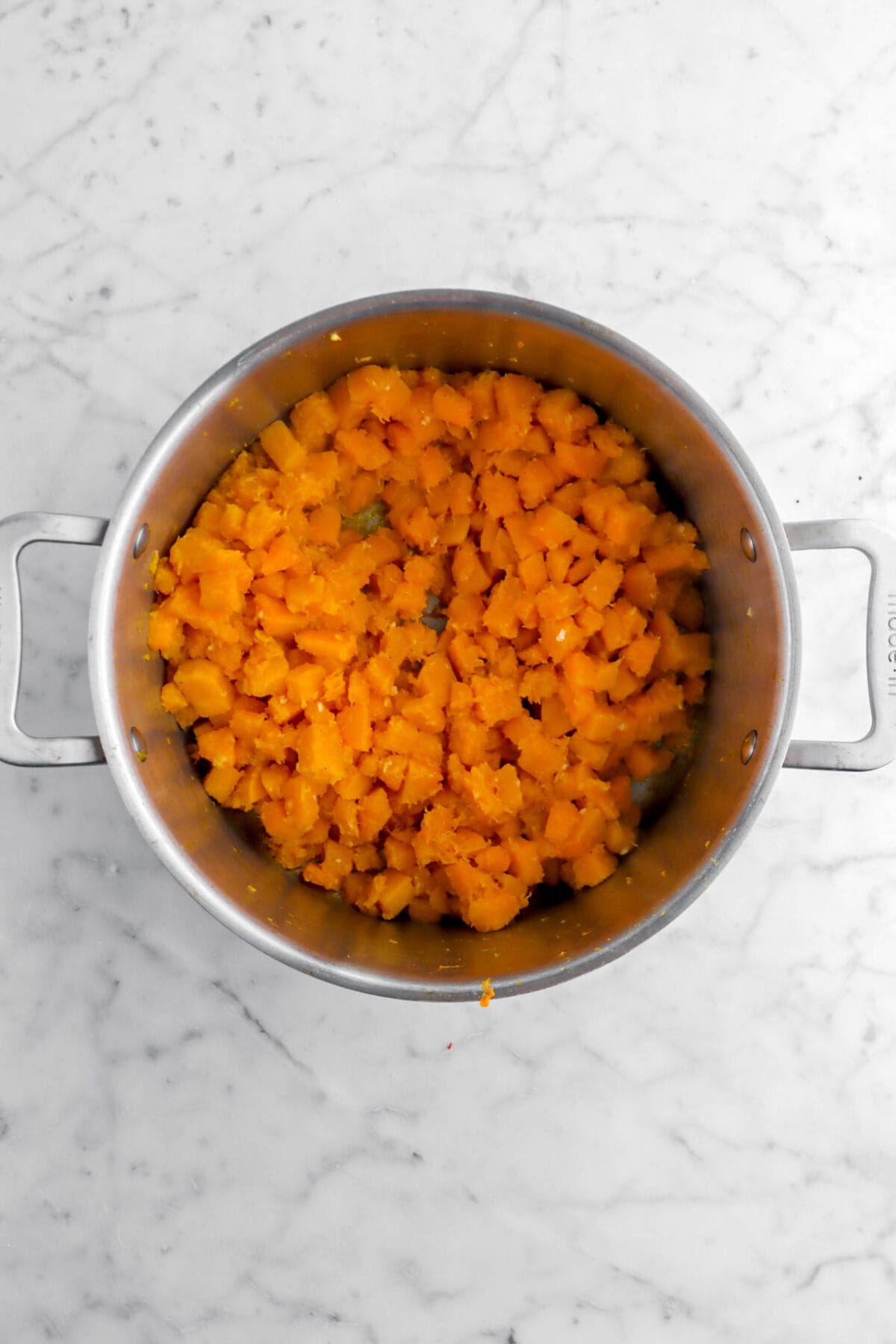 cooked butternut squash in large pot.