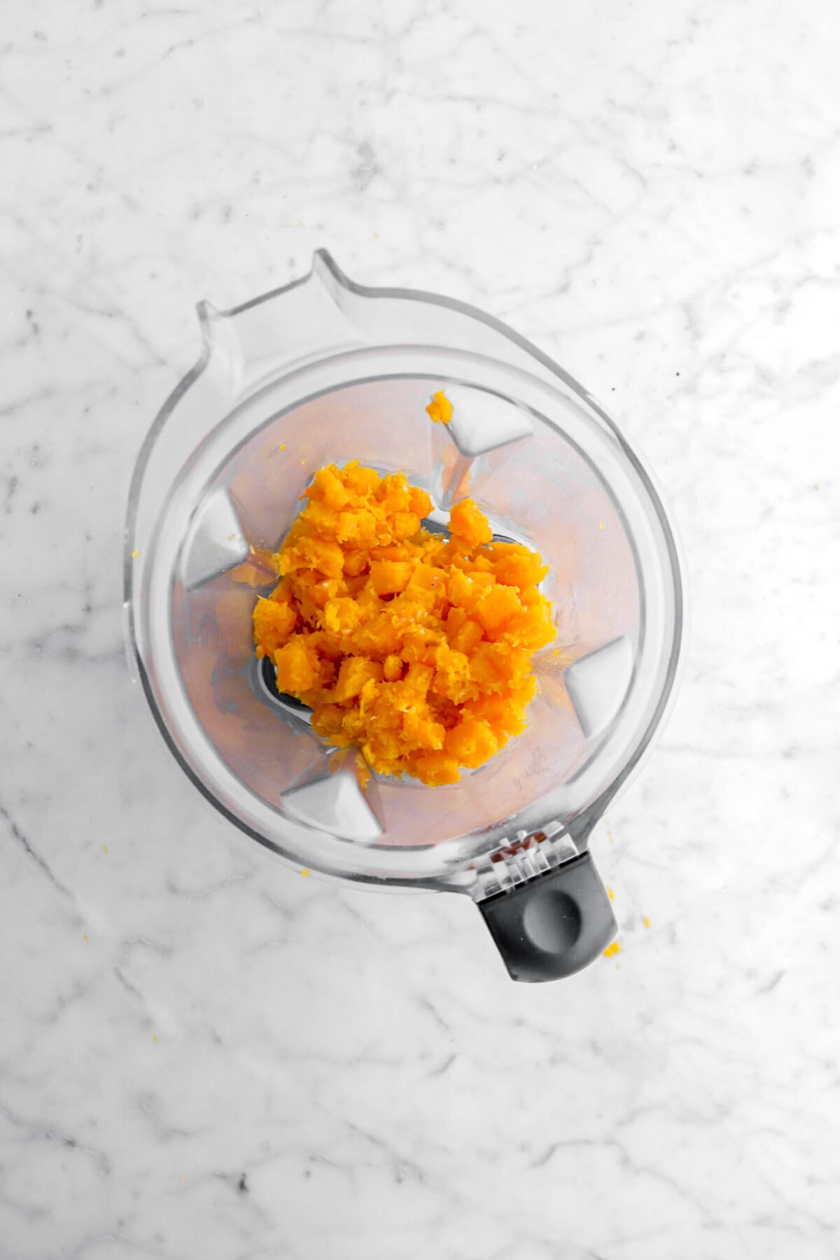 cooked butternut squash in blender.