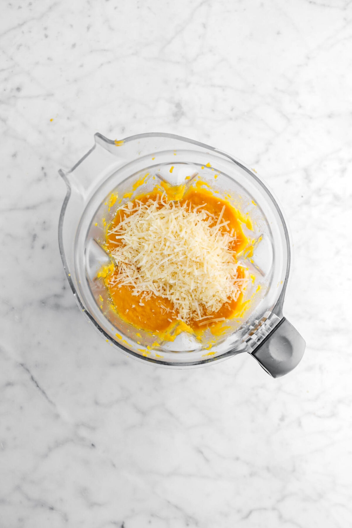 grated parmesan in blender with butternut squash.