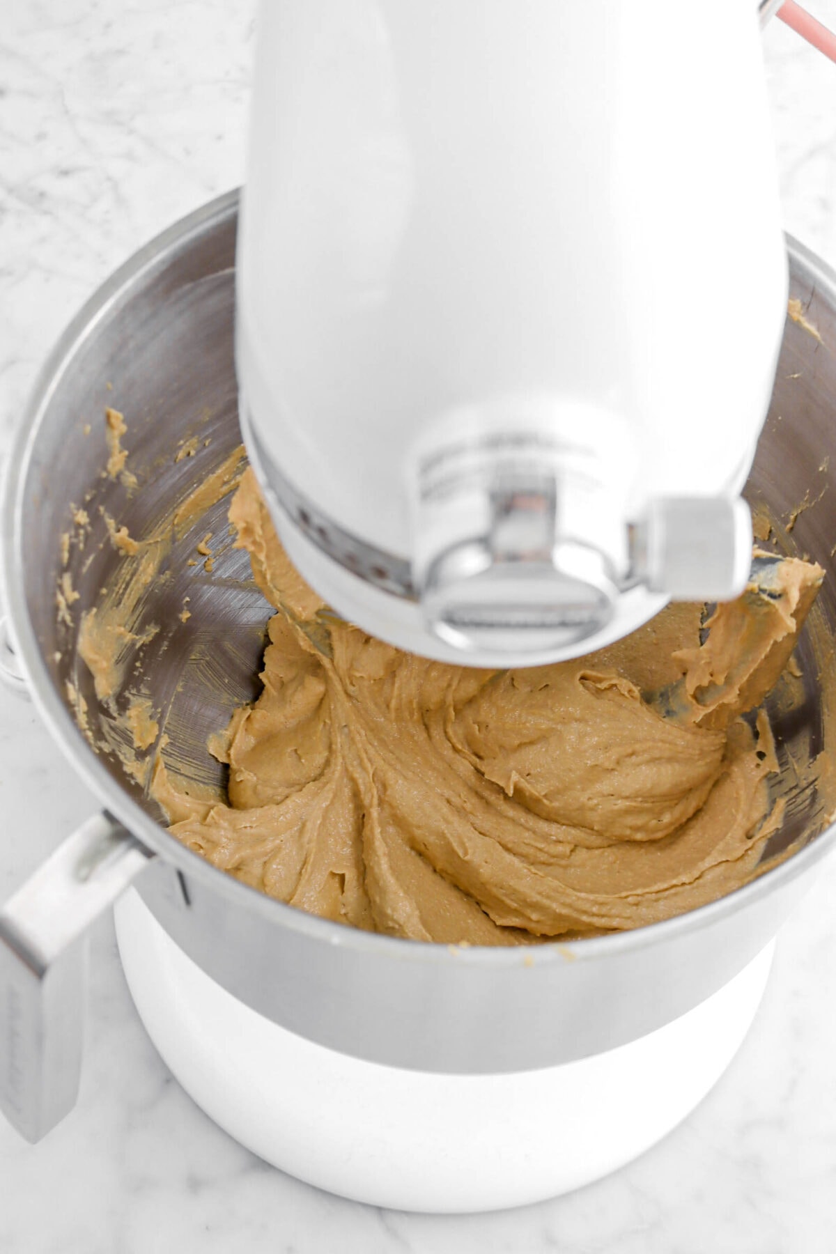 peanut butter and butter mixture in stand mixer.