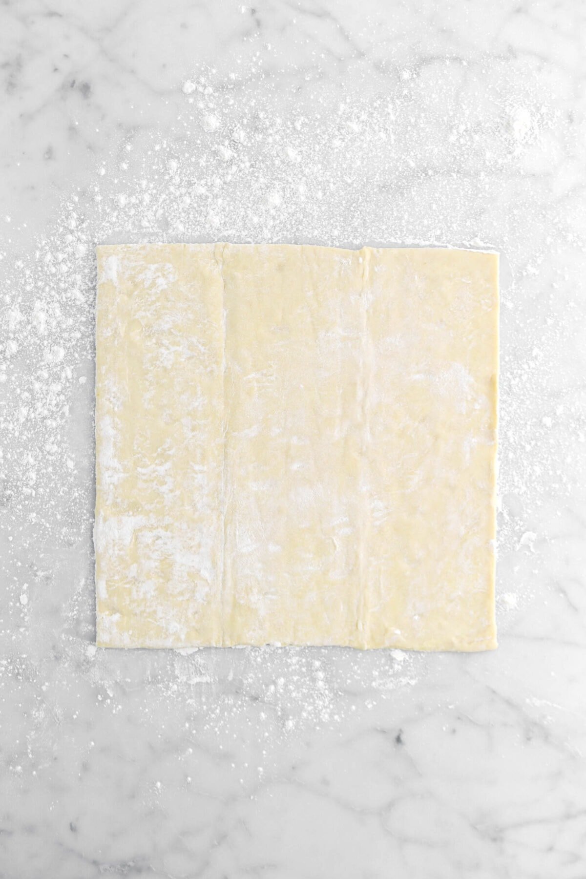 puff pastry dough on floured surface.