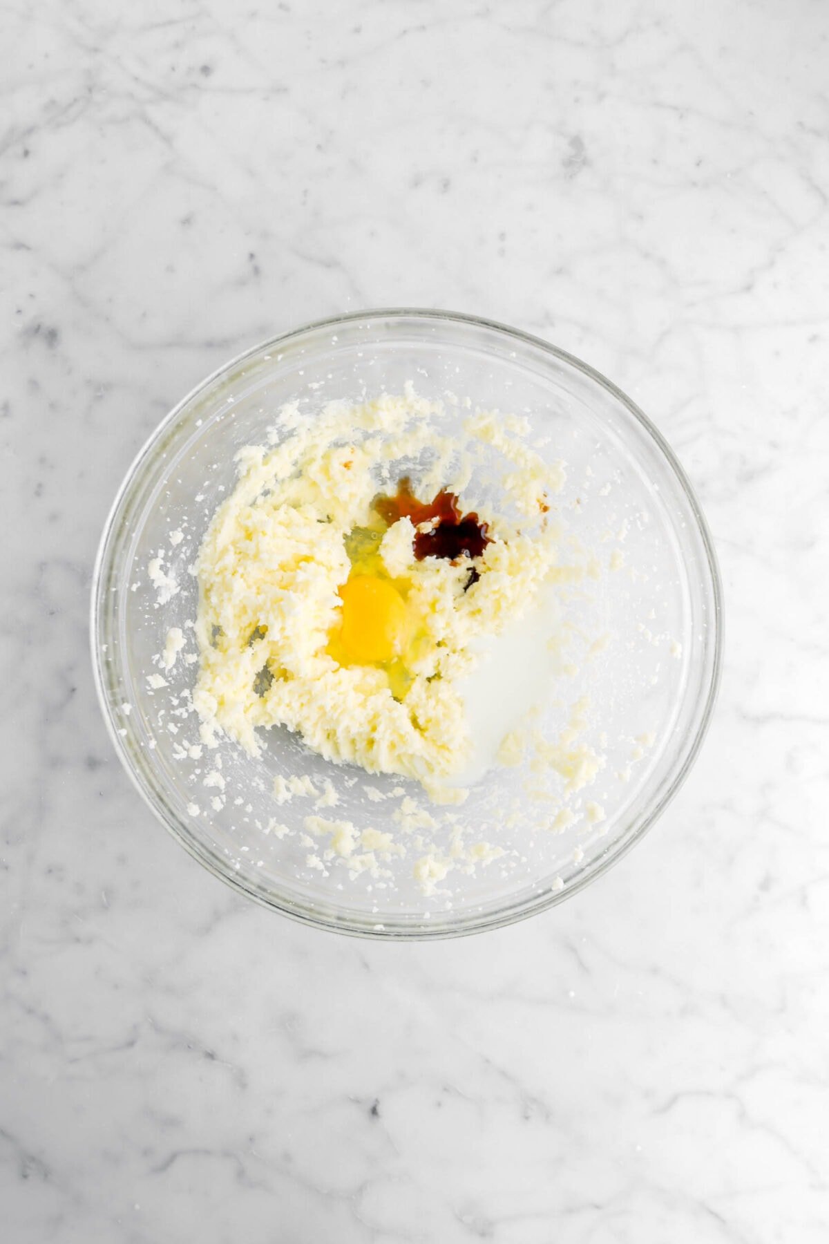 egg, vanilla, and milk added to butter and sugar mixture.