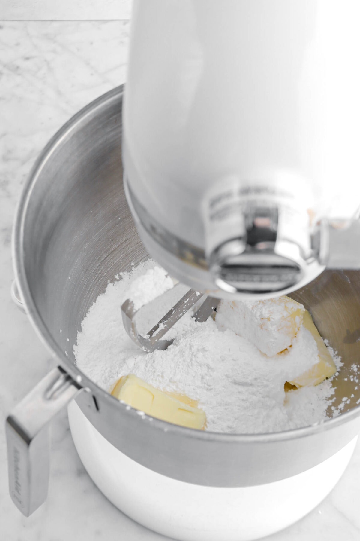 powdered sugar and butter in mixer.