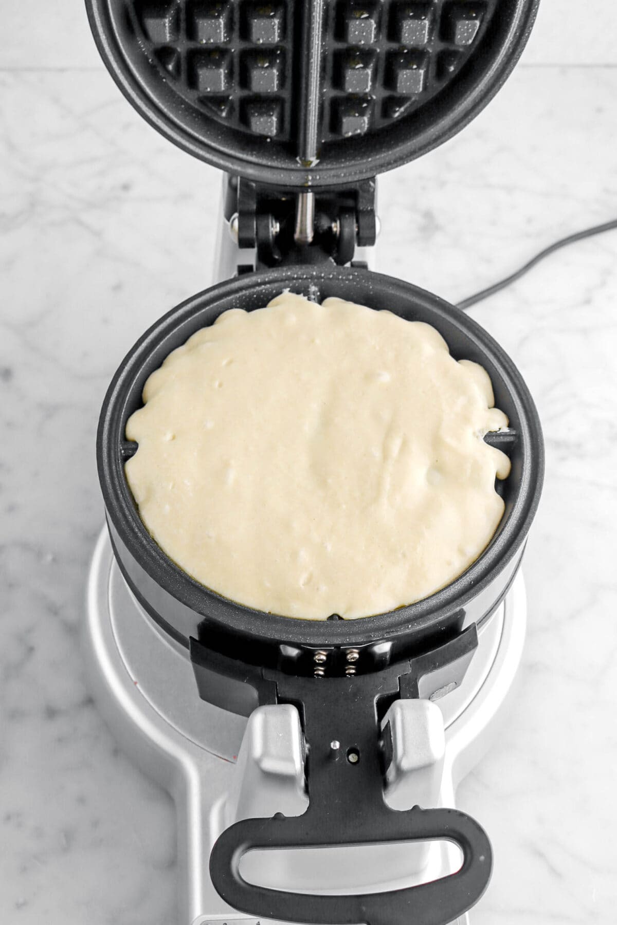 batter in waffle iron.