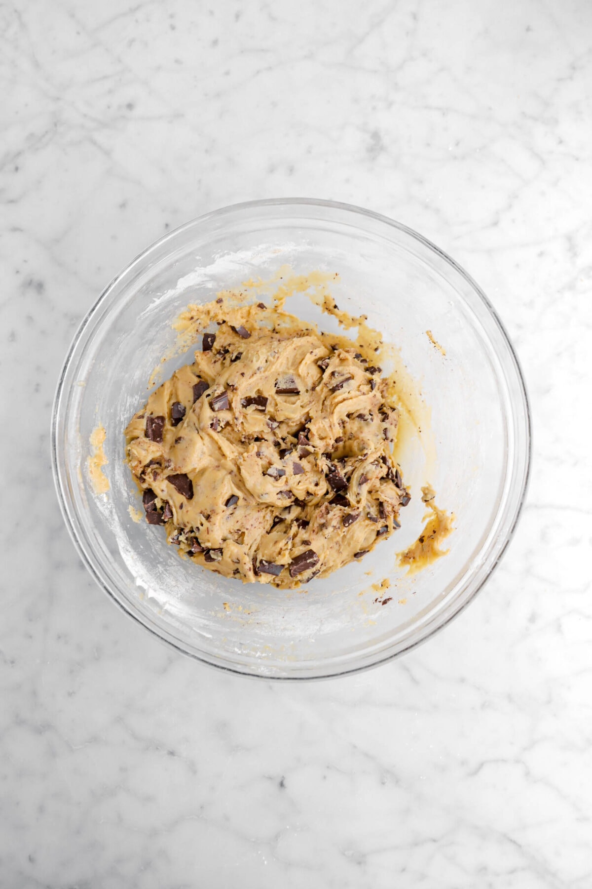 chocolate chip cookie dough in glass bowl.