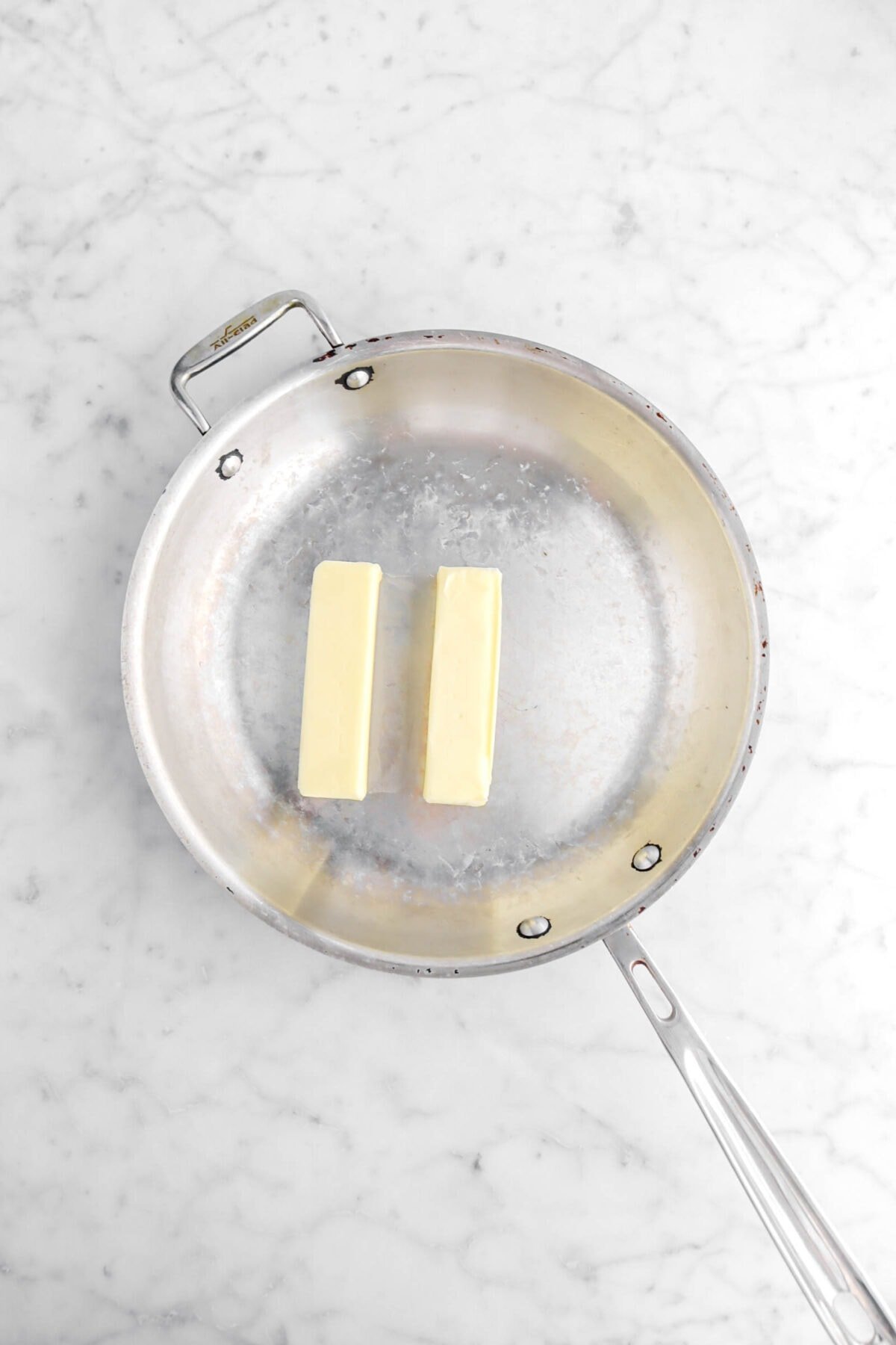 two sticks of butter in a skillet.